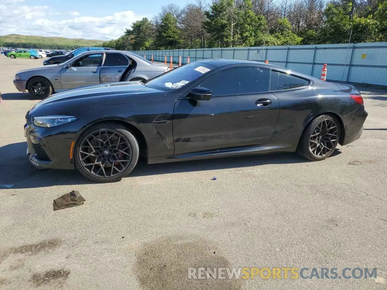 1 Photograph of a damaged car WBSAE0C08NCK00673 BMW M8 2022