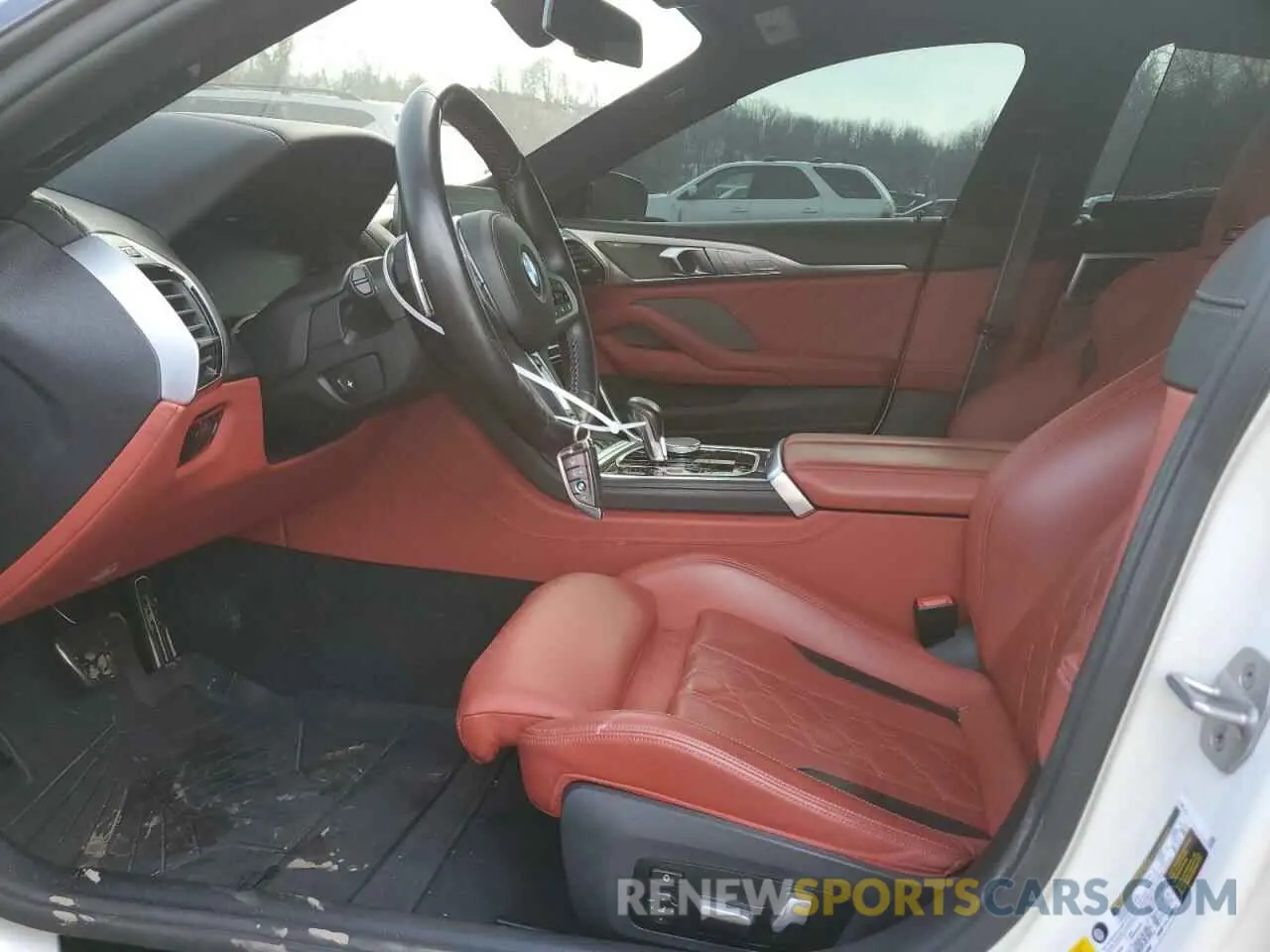 7 Photograph of a damaged car WBSGV0C06NCK00634 BMW M8 2022