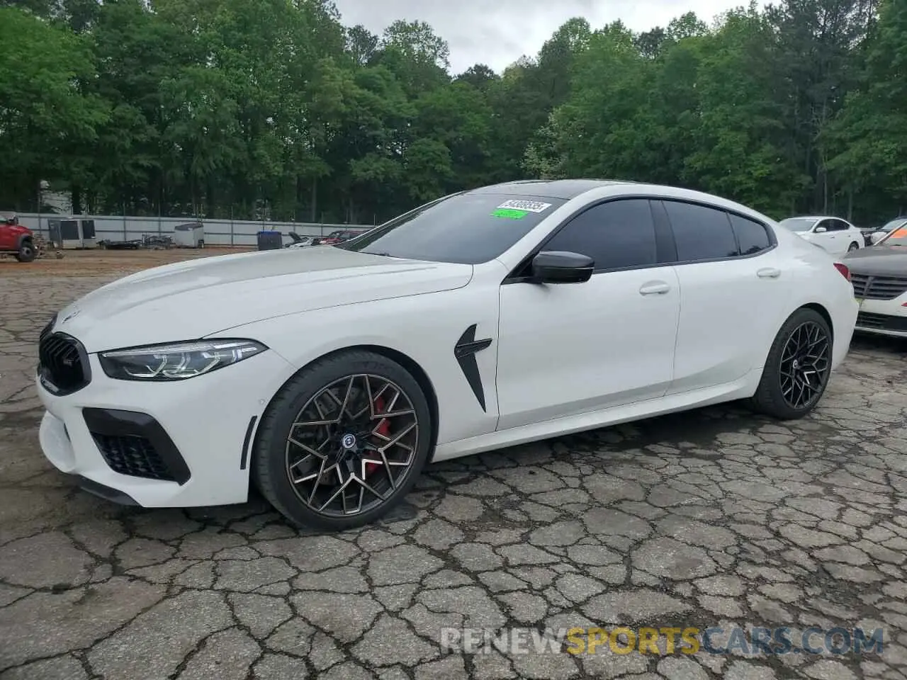 1 Photograph of a damaged car WBSGV0C07NCJ81642 BMW M8 2022