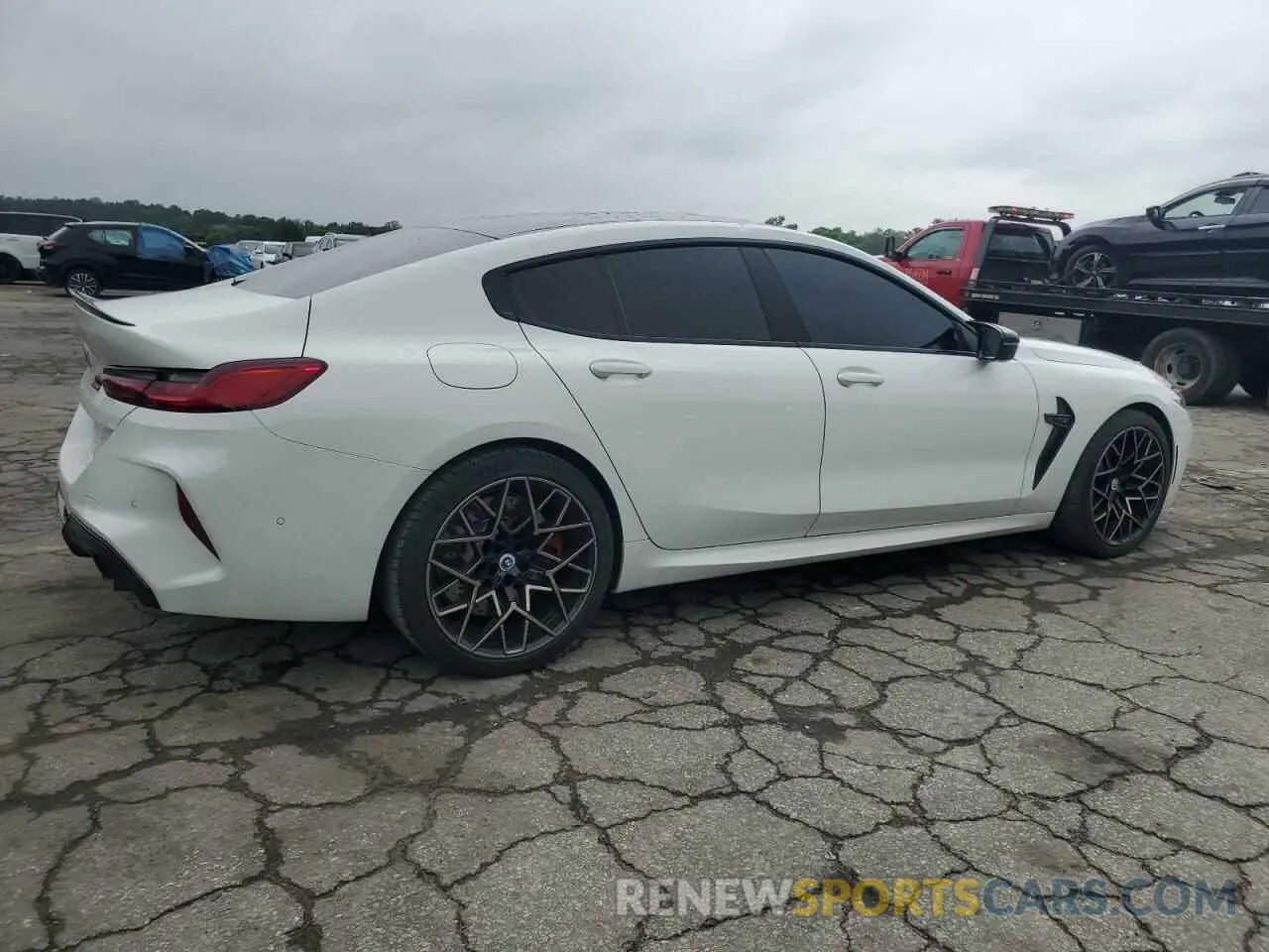 3 Photograph of a damaged car WBSGV0C07NCJ81642 BMW M8 2022
