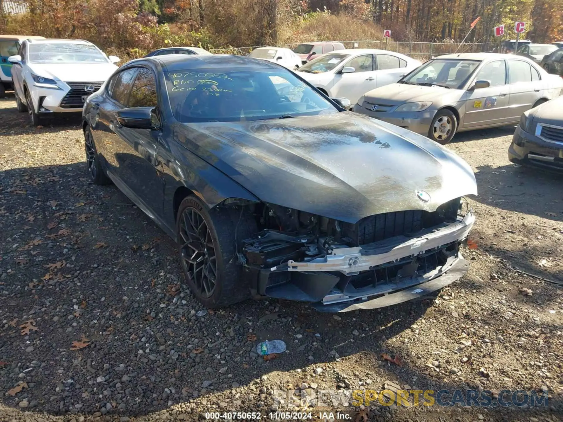 1 Photograph of a damaged car WBSAE0C01PCL57271 BMW M8 2023