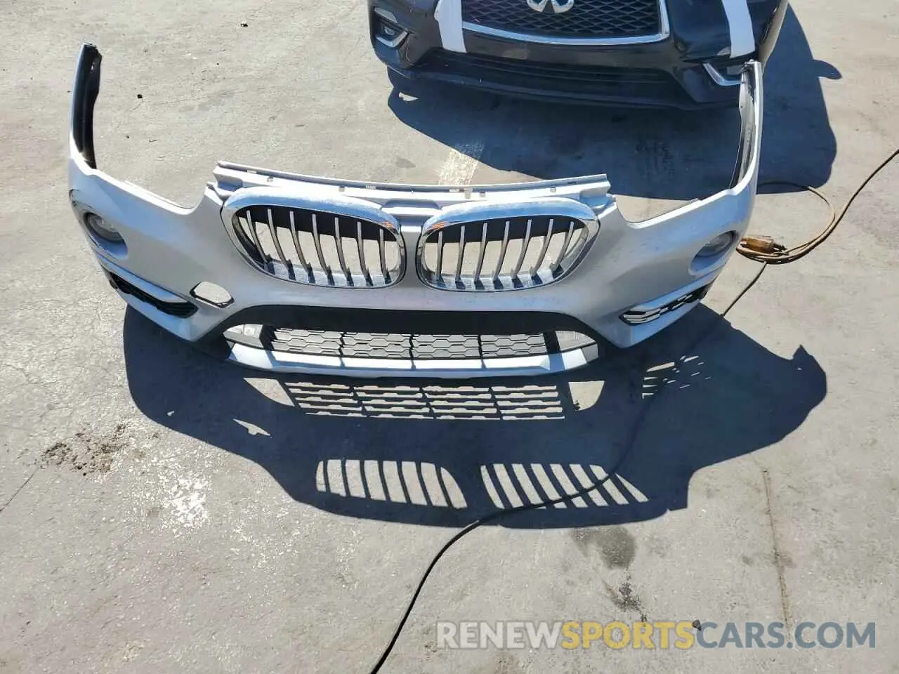 13 Photograph of a damaged car WBXHU7C50K3H44244 BMW X1 2019