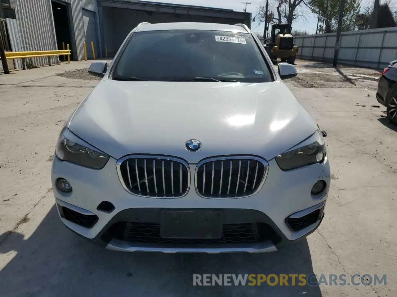 5 Photograph of a damaged car WBXHU7C52K3H44195 BMW X1 2019