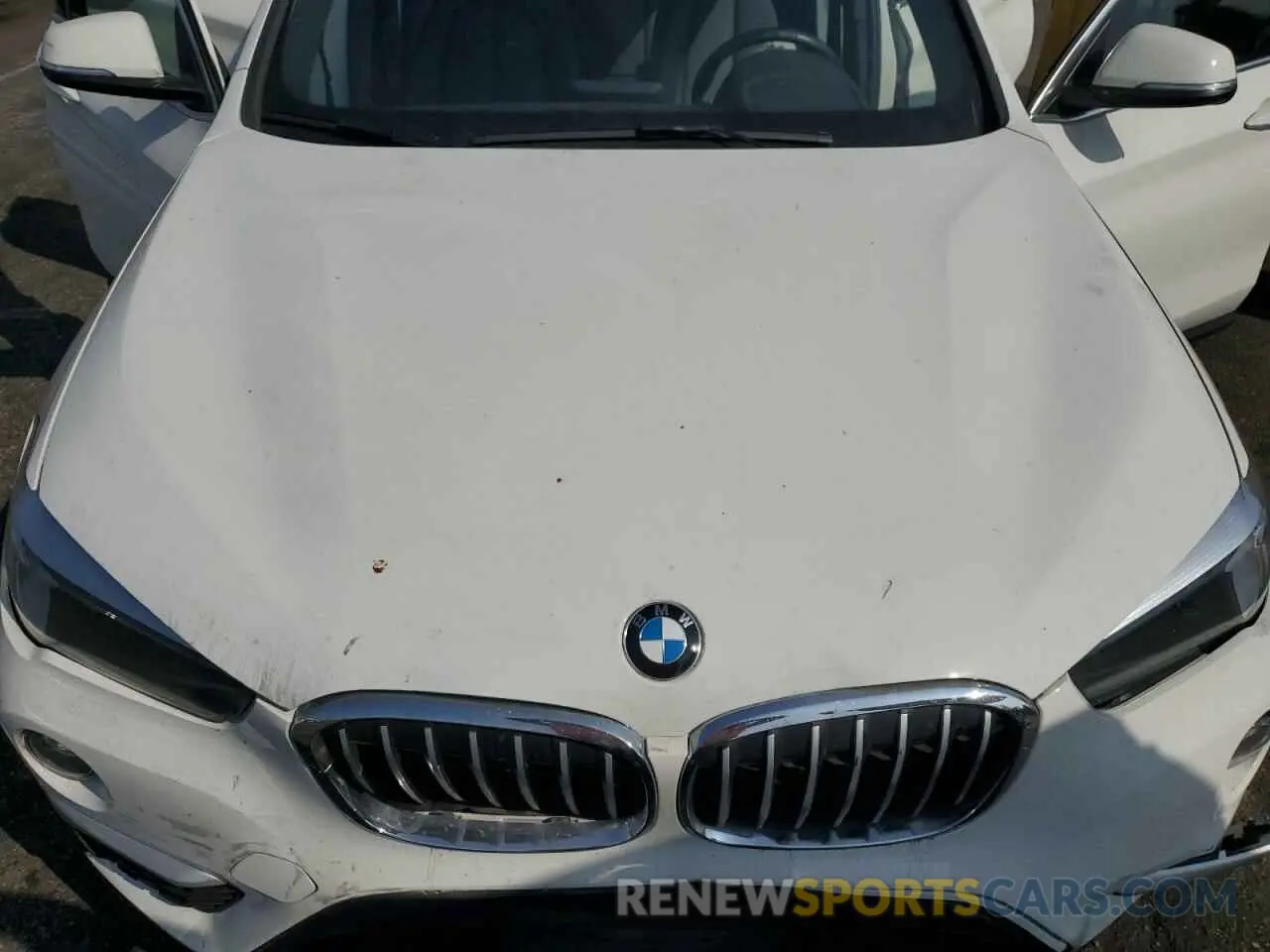 12 Photograph of a damaged car WBXHU7C53K3H45906 BMW X1 2019