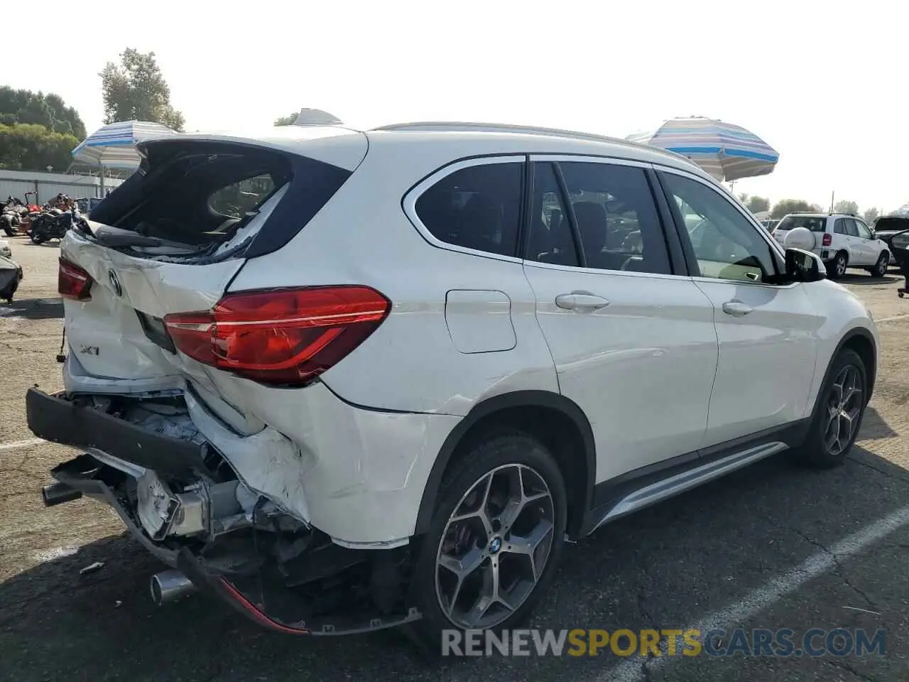 3 Photograph of a damaged car WBXHU7C53K3H45906 BMW X1 2019