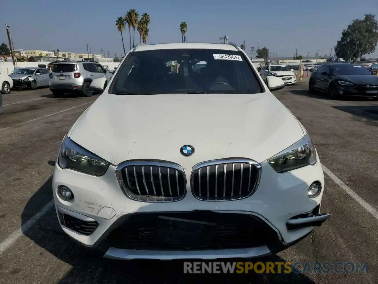 5 Photograph of a damaged car WBXHU7C53K3H45906 BMW X1 2019