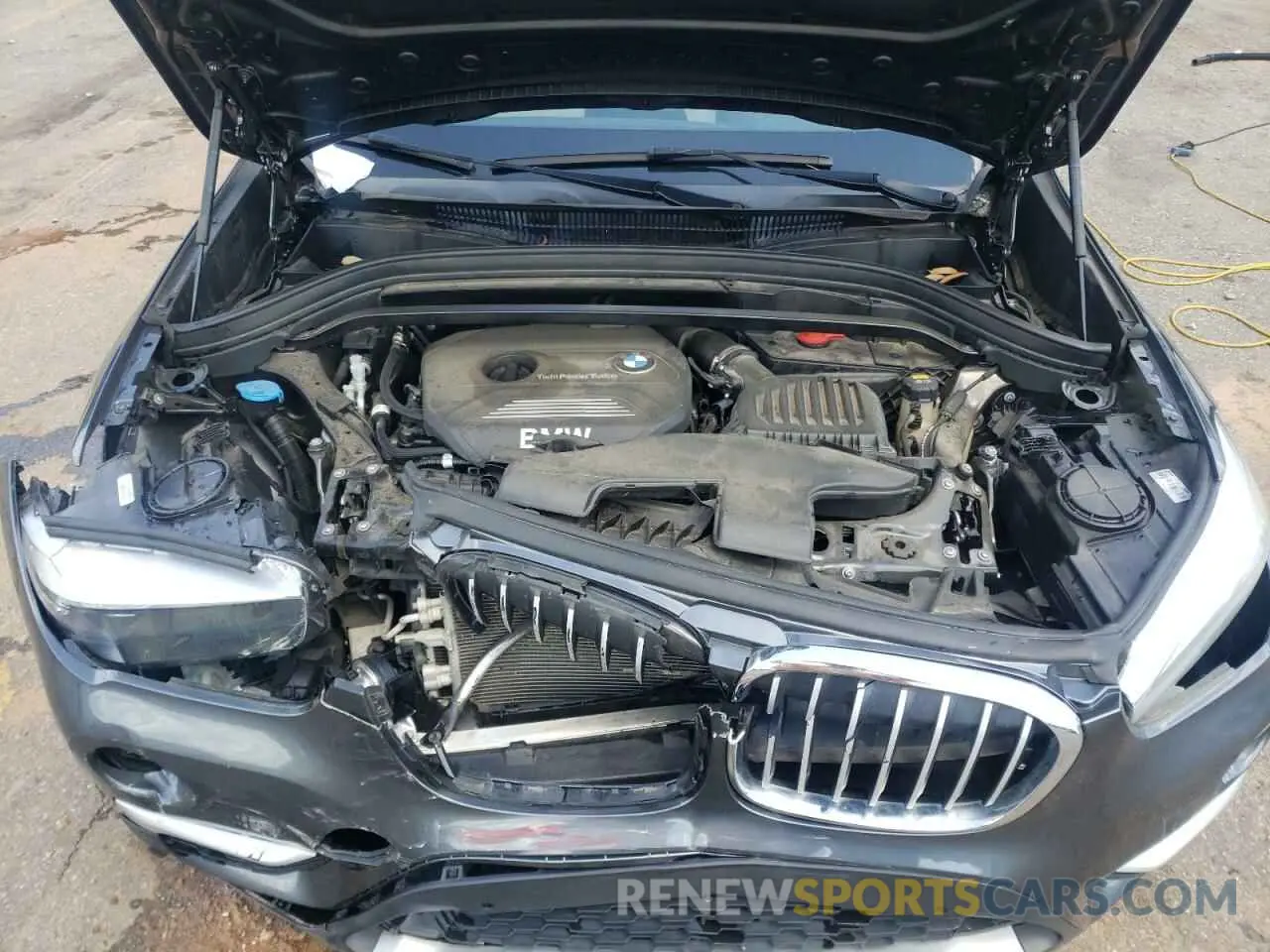 12 Photograph of a damaged car WBXHU7C54K3H46420 BMW X1 2019