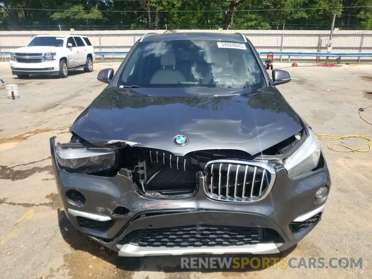 5 Photograph of a damaged car WBXHU7C54K3H46420 BMW X1 2019