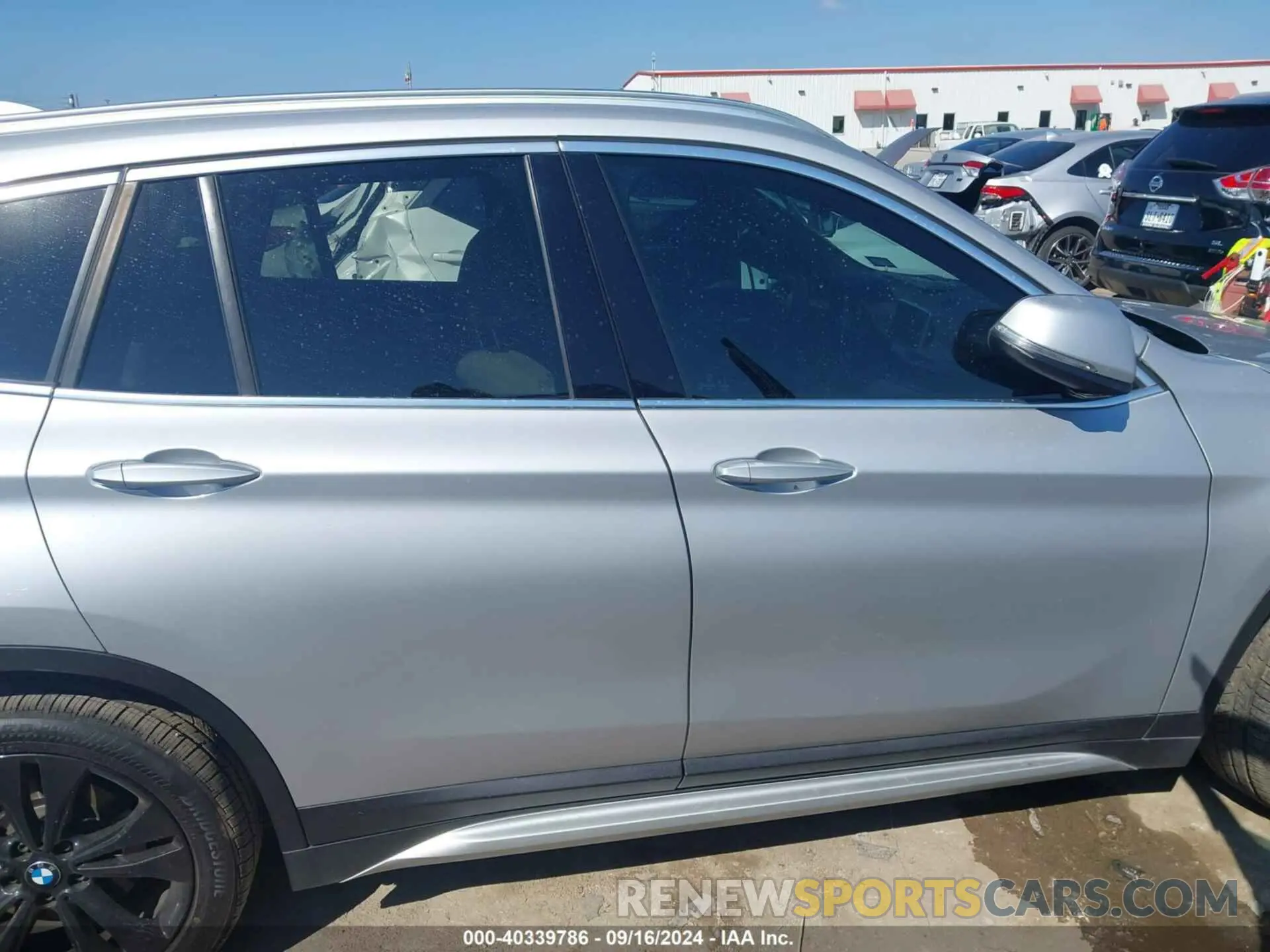13 Photograph of a damaged car WBXJG7C0XL5R61316 BMW X1 2020