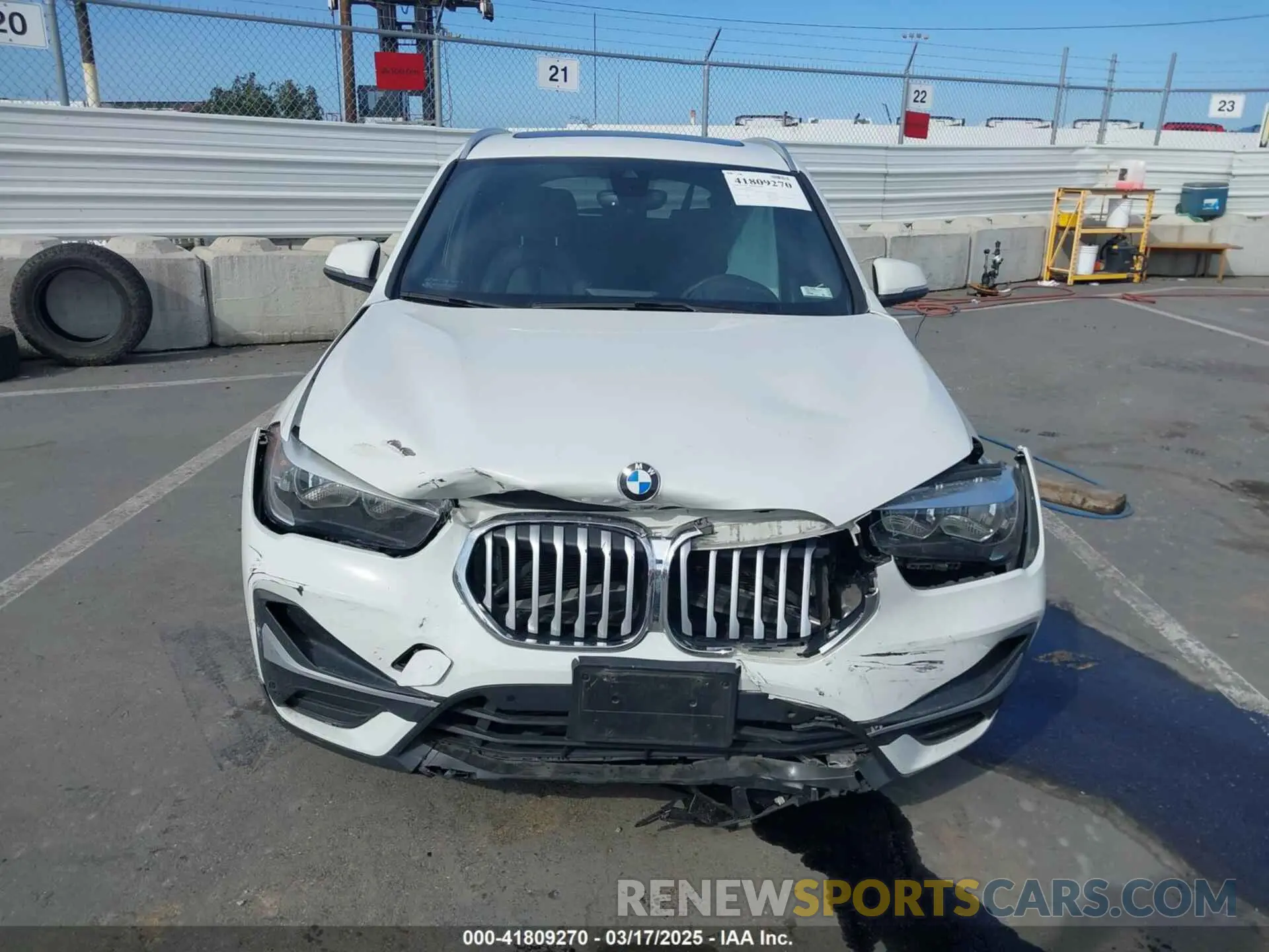 12 Photograph of a damaged car WBXJG7C00M5S02921 BMW X1 2021