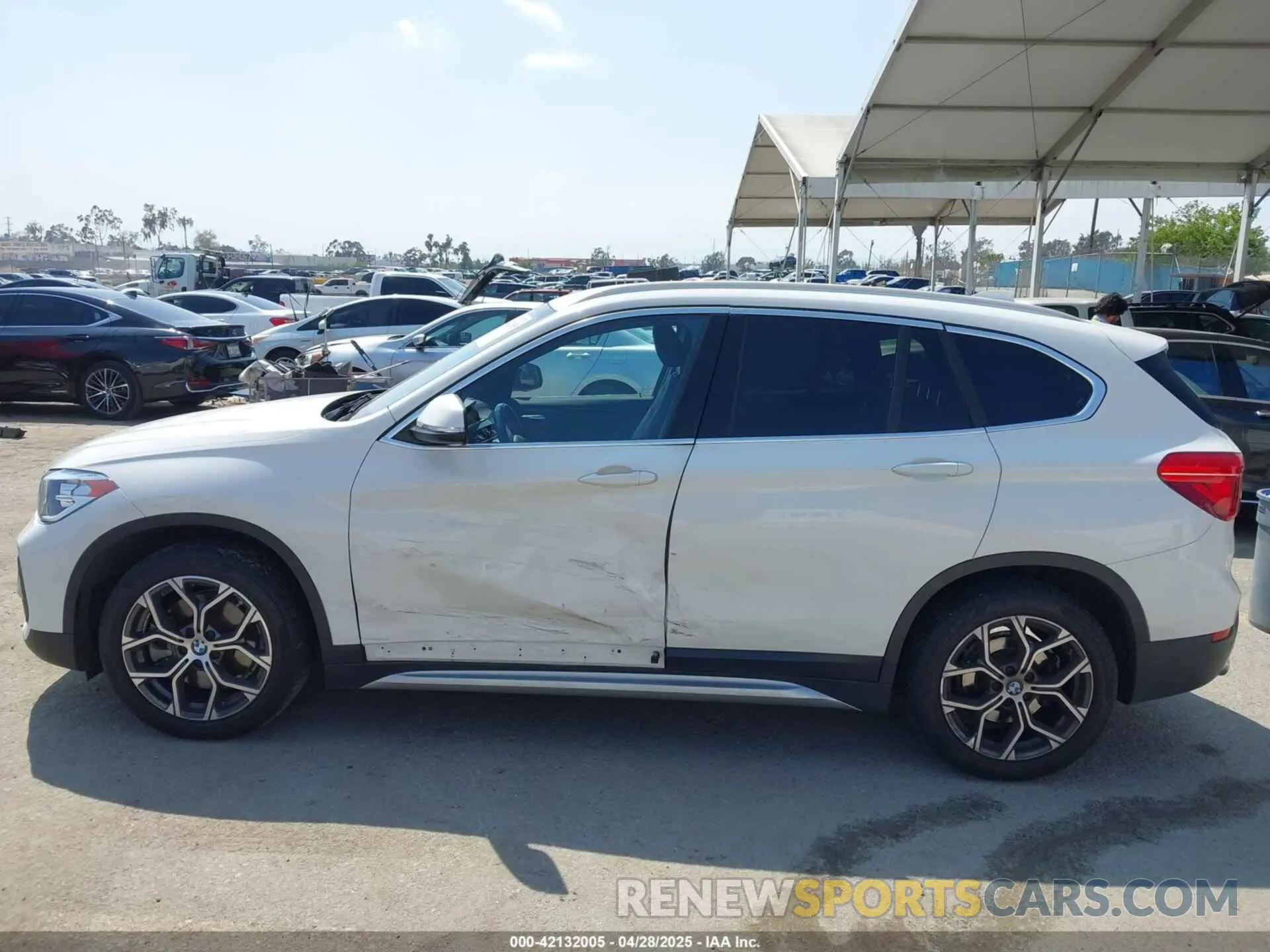 14 Photograph of a damaged car WBXJG7C01M3M73496 BMW X1 2021