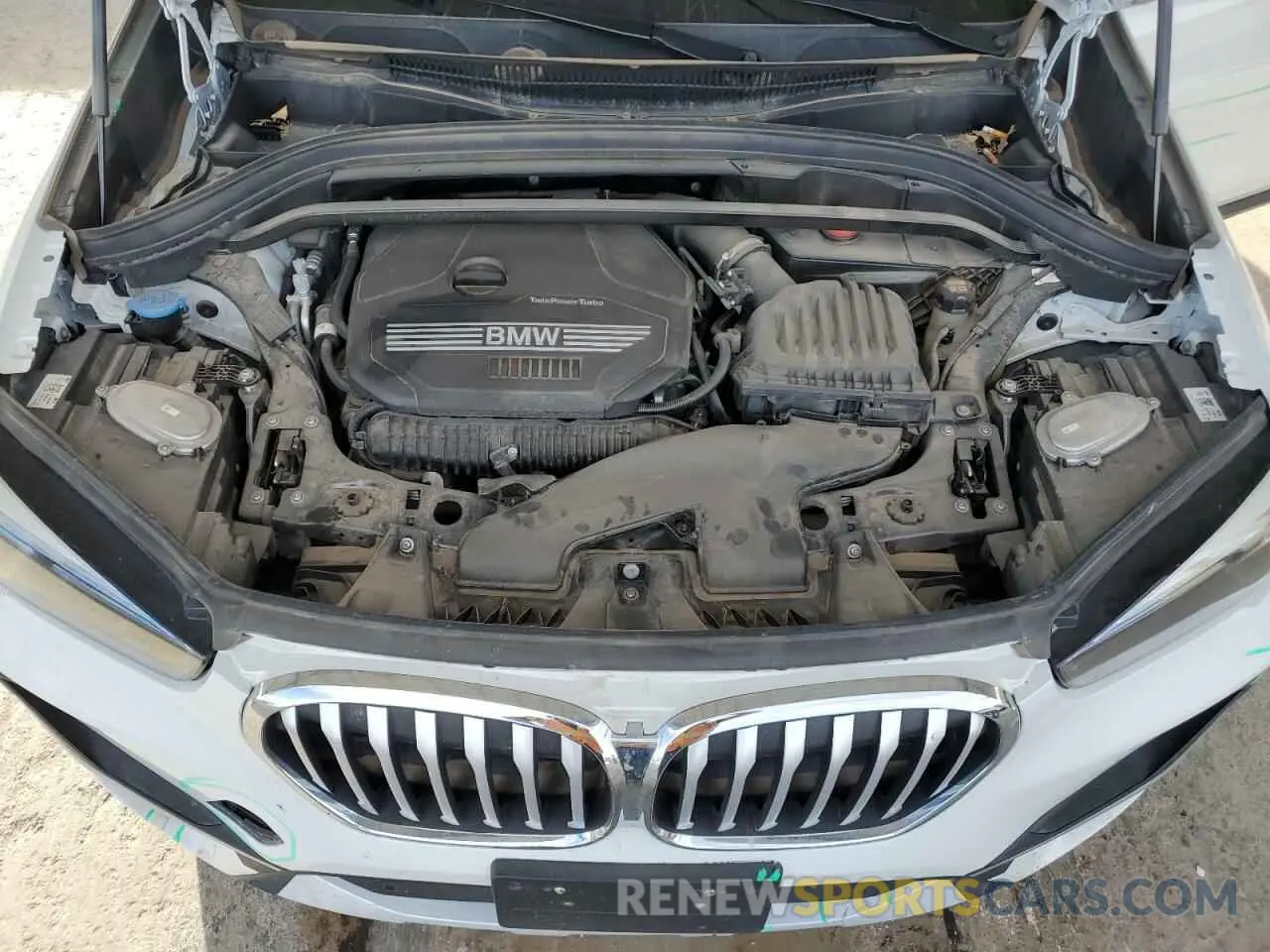 12 Photograph of a damaged car WBXJG7C01M5T08696 BMW X1 2021