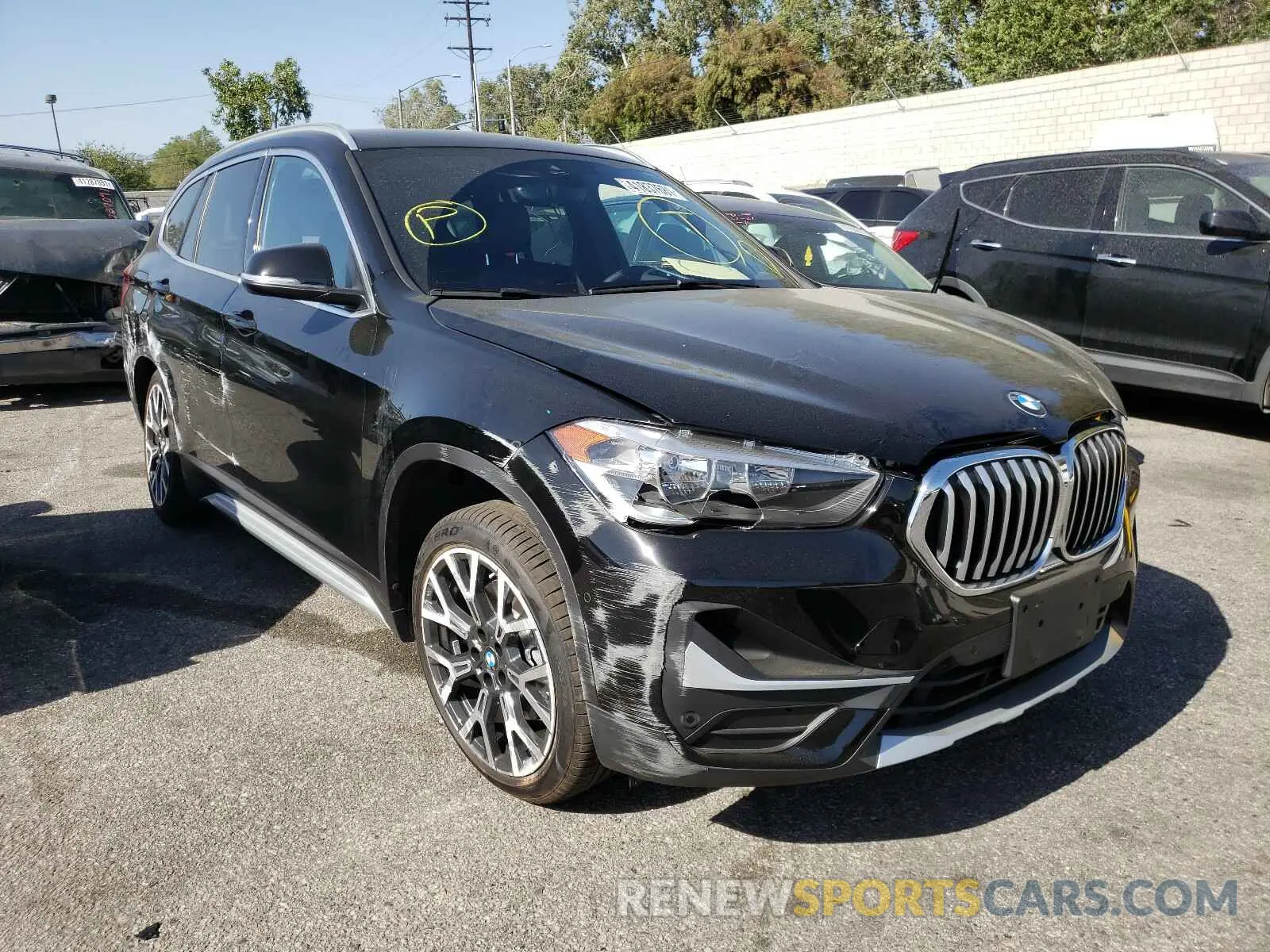 1 Photograph of a damaged car WBXJG7C03M5T14077 BMW X1 2021