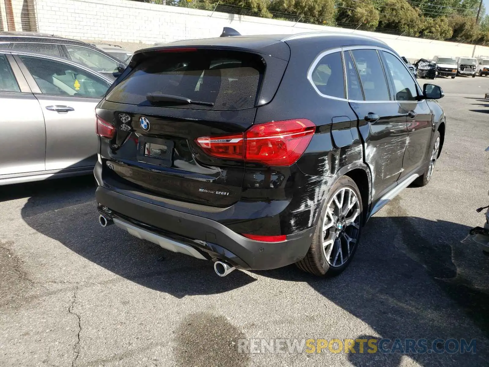 4 Photograph of a damaged car WBXJG7C03M5T14077 BMW X1 2021