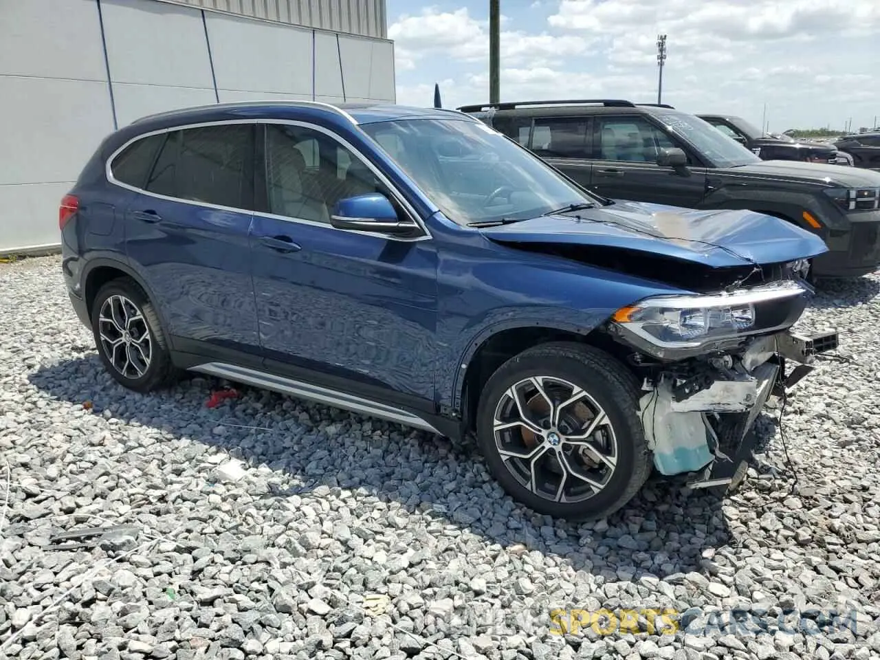 4 Photograph of a damaged car WBXJG7C06M5S00879 BMW X1 2021