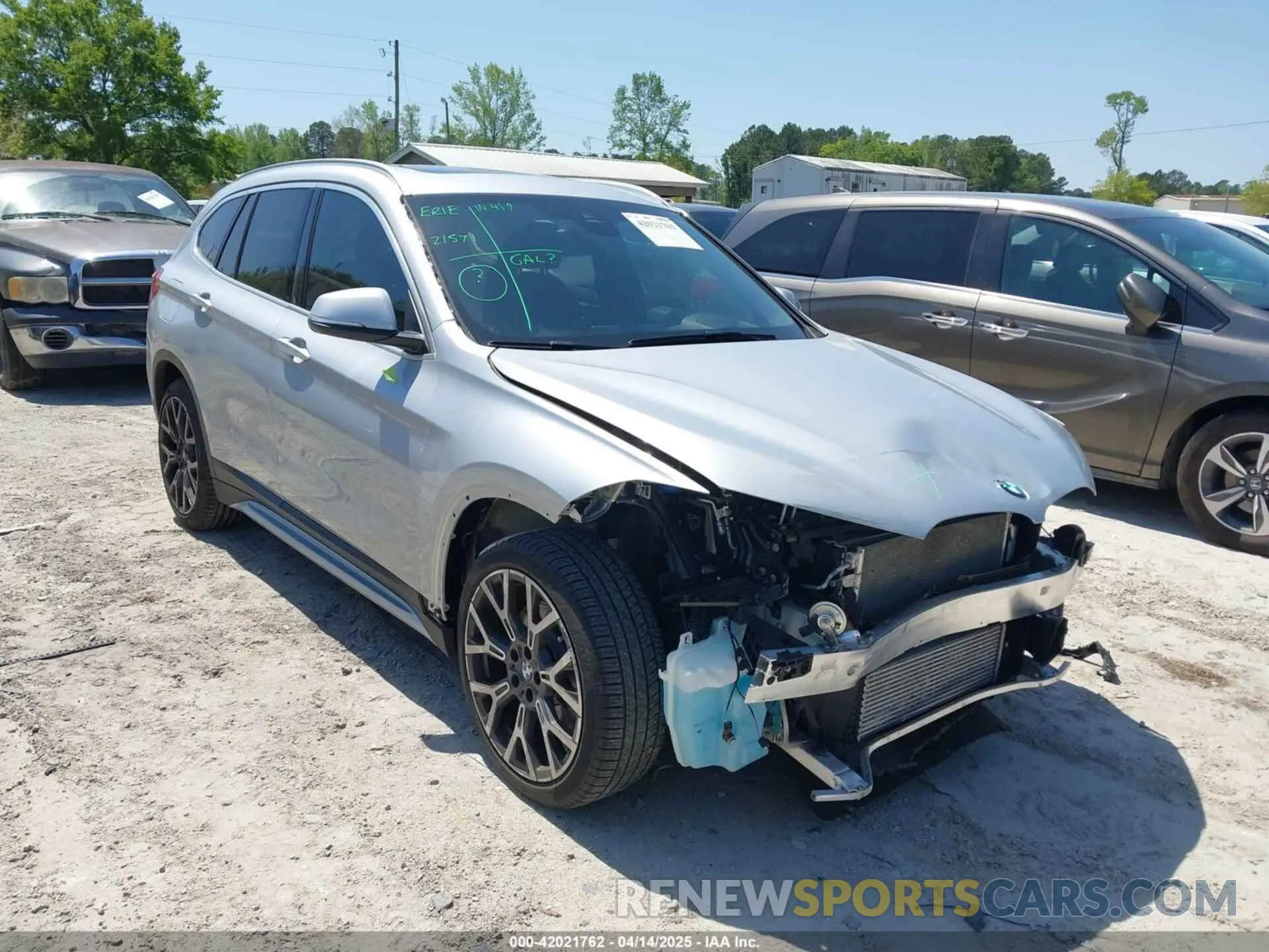 1 Photograph of a damaged car WBXJG7C06M5T14235 BMW X1 2021