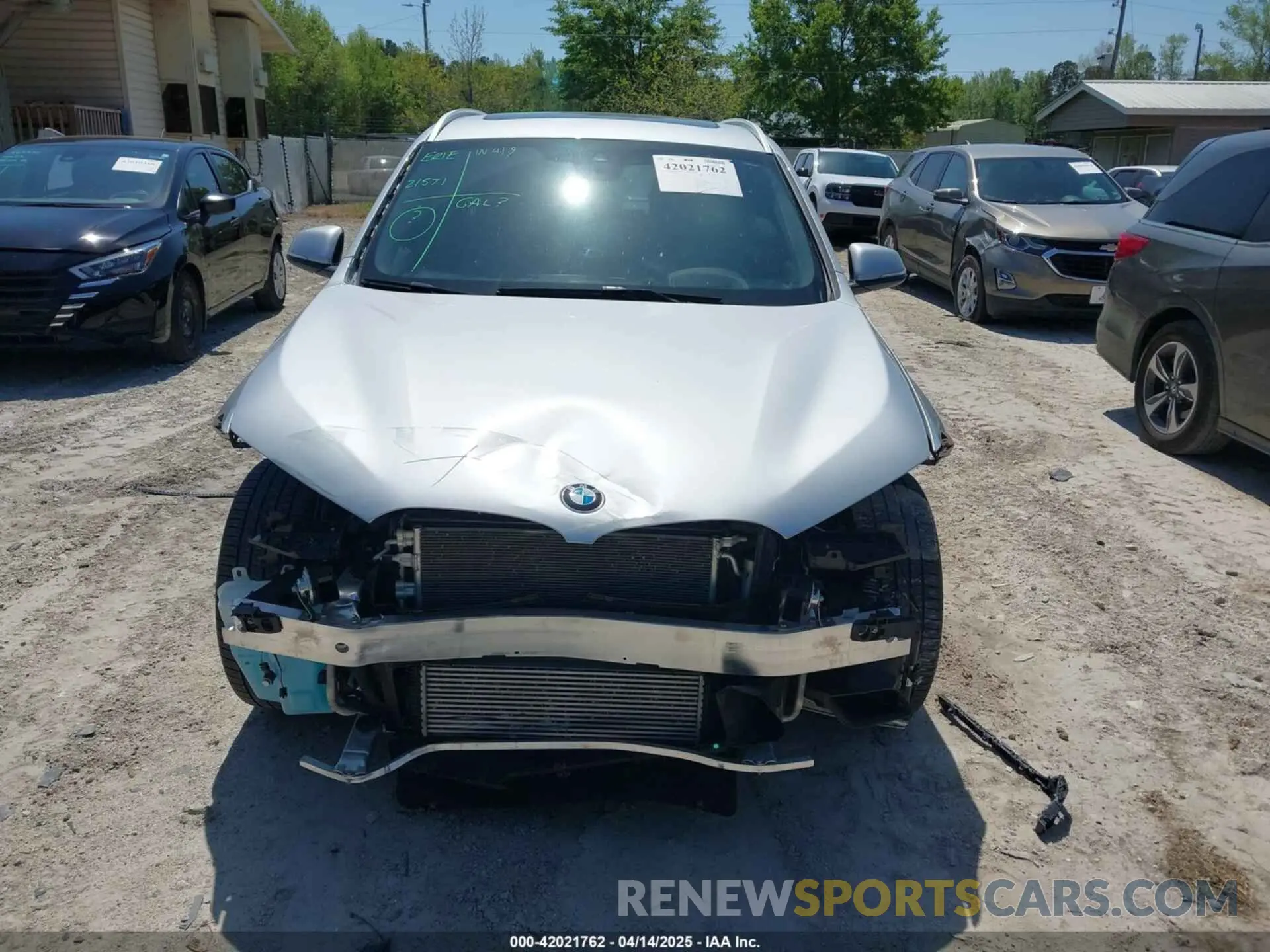 12 Photograph of a damaged car WBXJG7C06M5T14235 BMW X1 2021