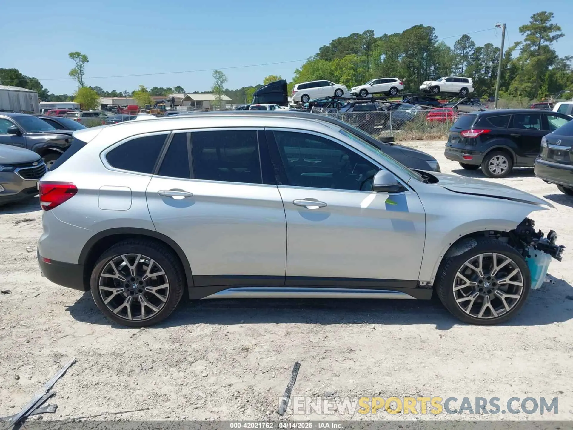13 Photograph of a damaged car WBXJG7C06M5T14235 BMW X1 2021