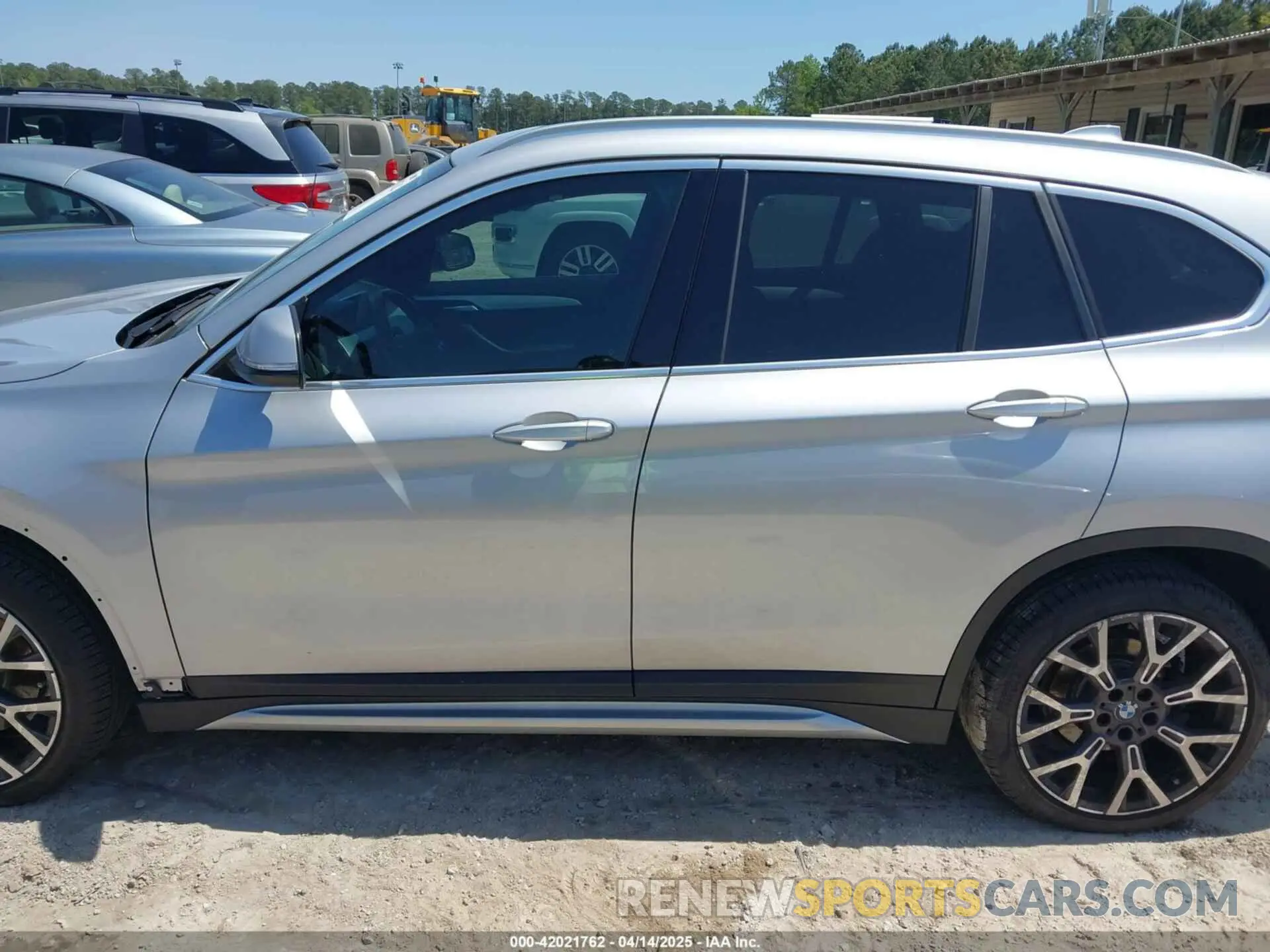 14 Photograph of a damaged car WBXJG7C06M5T14235 BMW X1 2021
