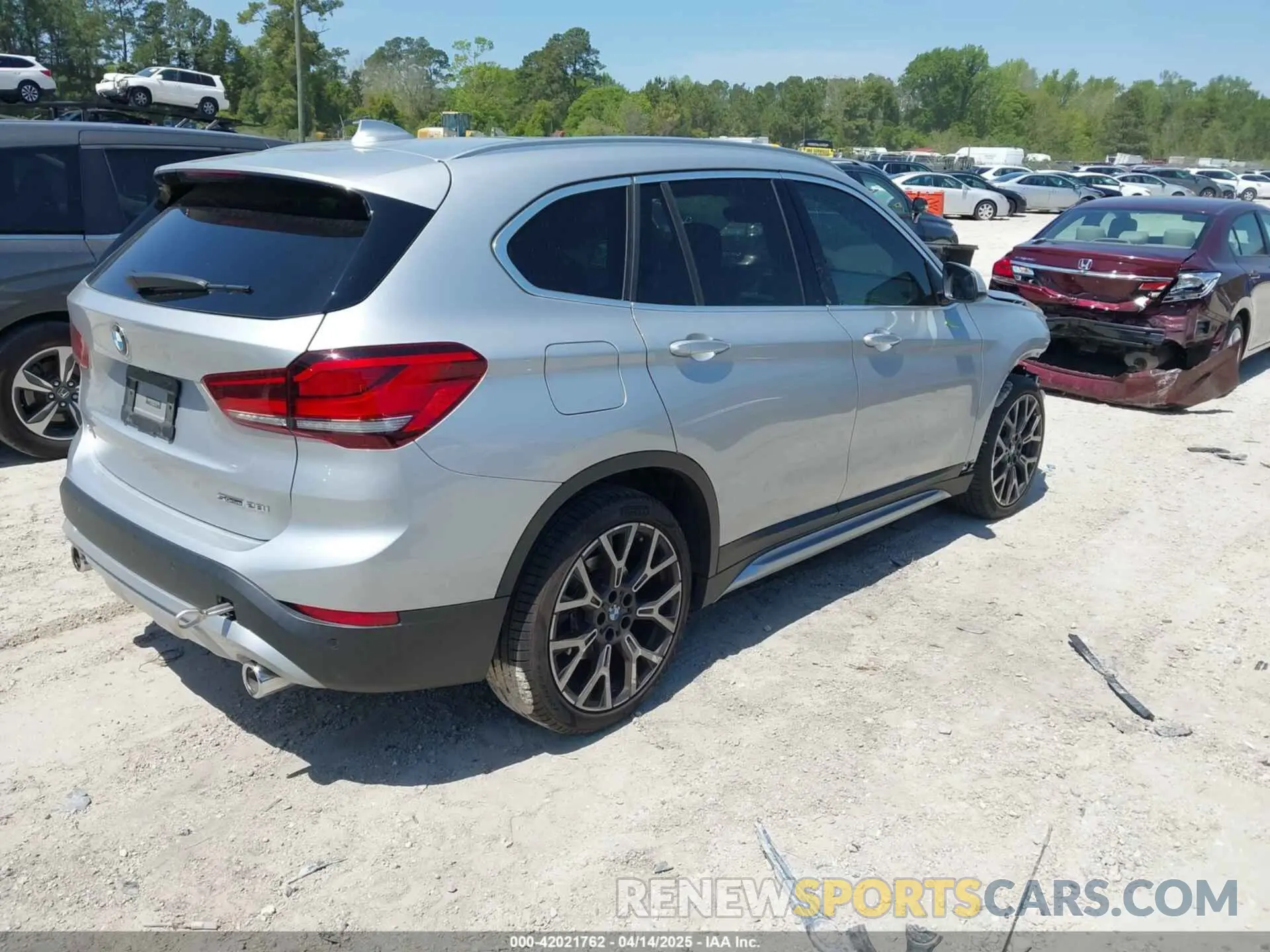 4 Photograph of a damaged car WBXJG7C06M5T14235 BMW X1 2021
