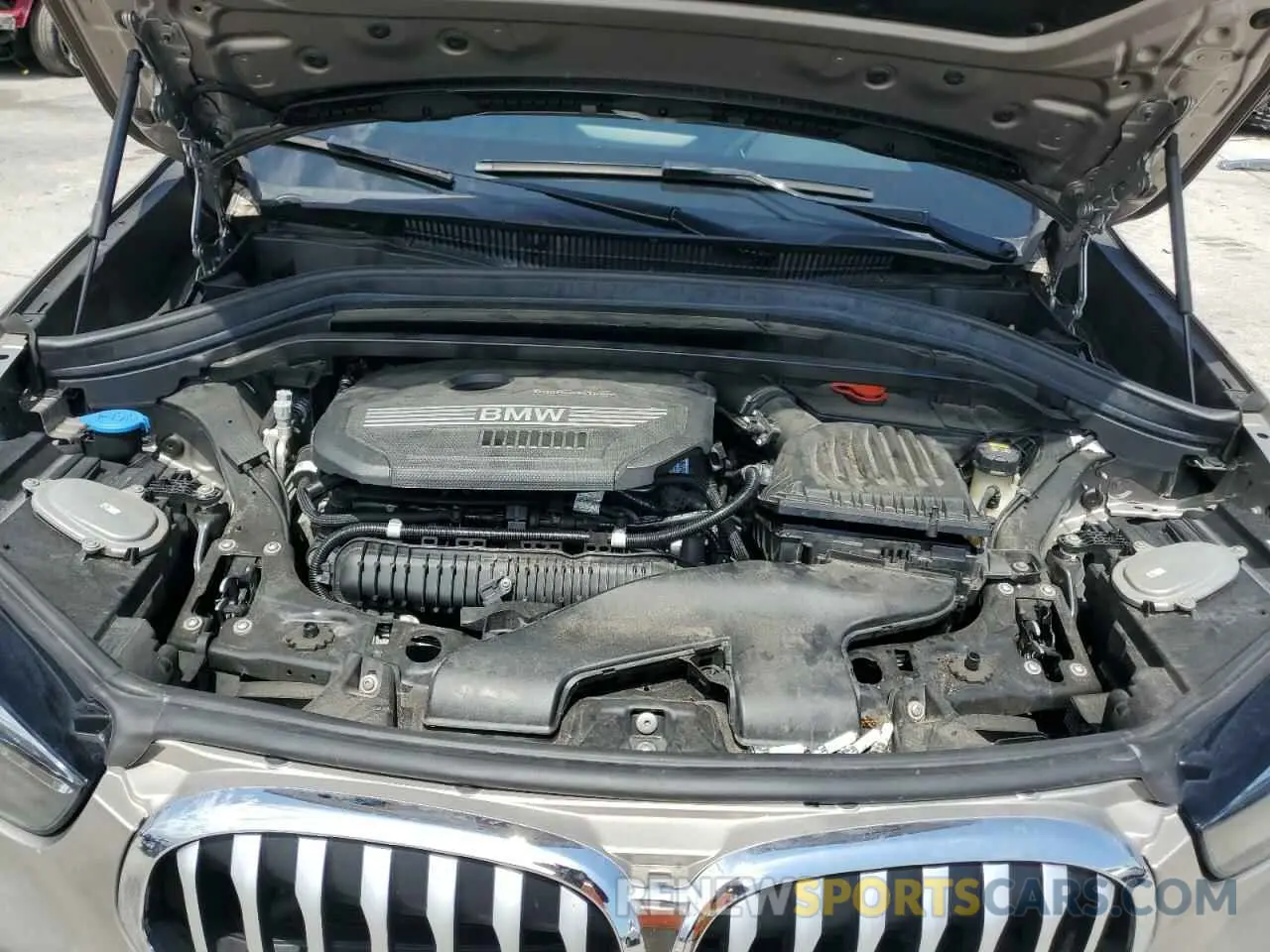 12 Photograph of a damaged car WBXJG7C08M5S33866 BMW X1 2021