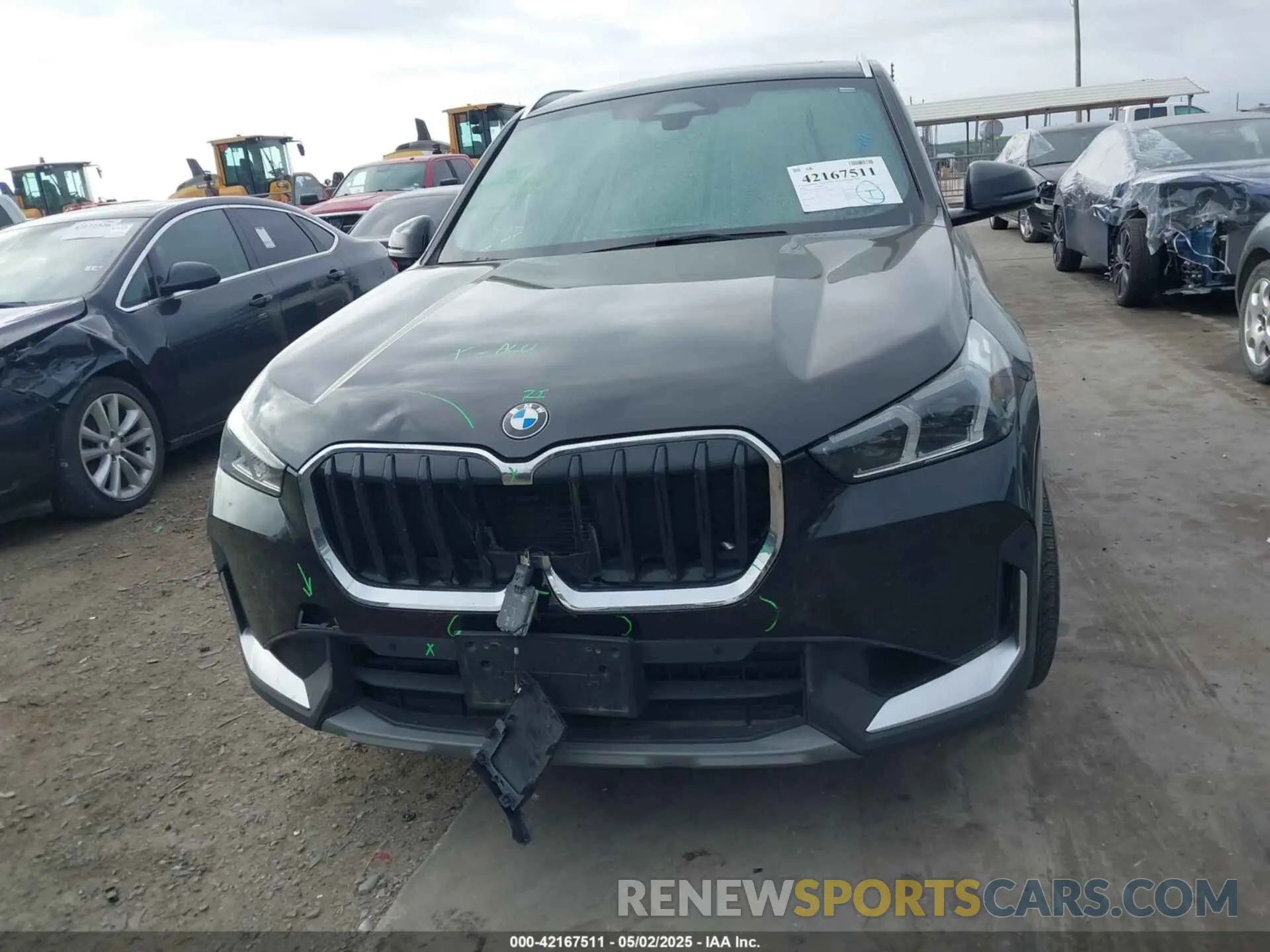 12 Photograph of a damaged car WBX73EF04P5W37659 BMW X1 2023