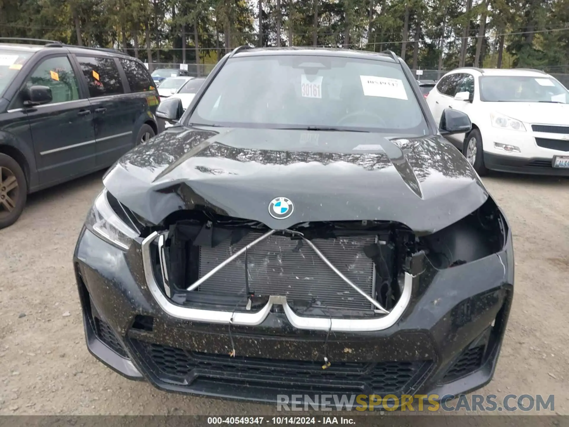 12 Photograph of a damaged car WBX73EF04P5X07323 BMW X1 2023