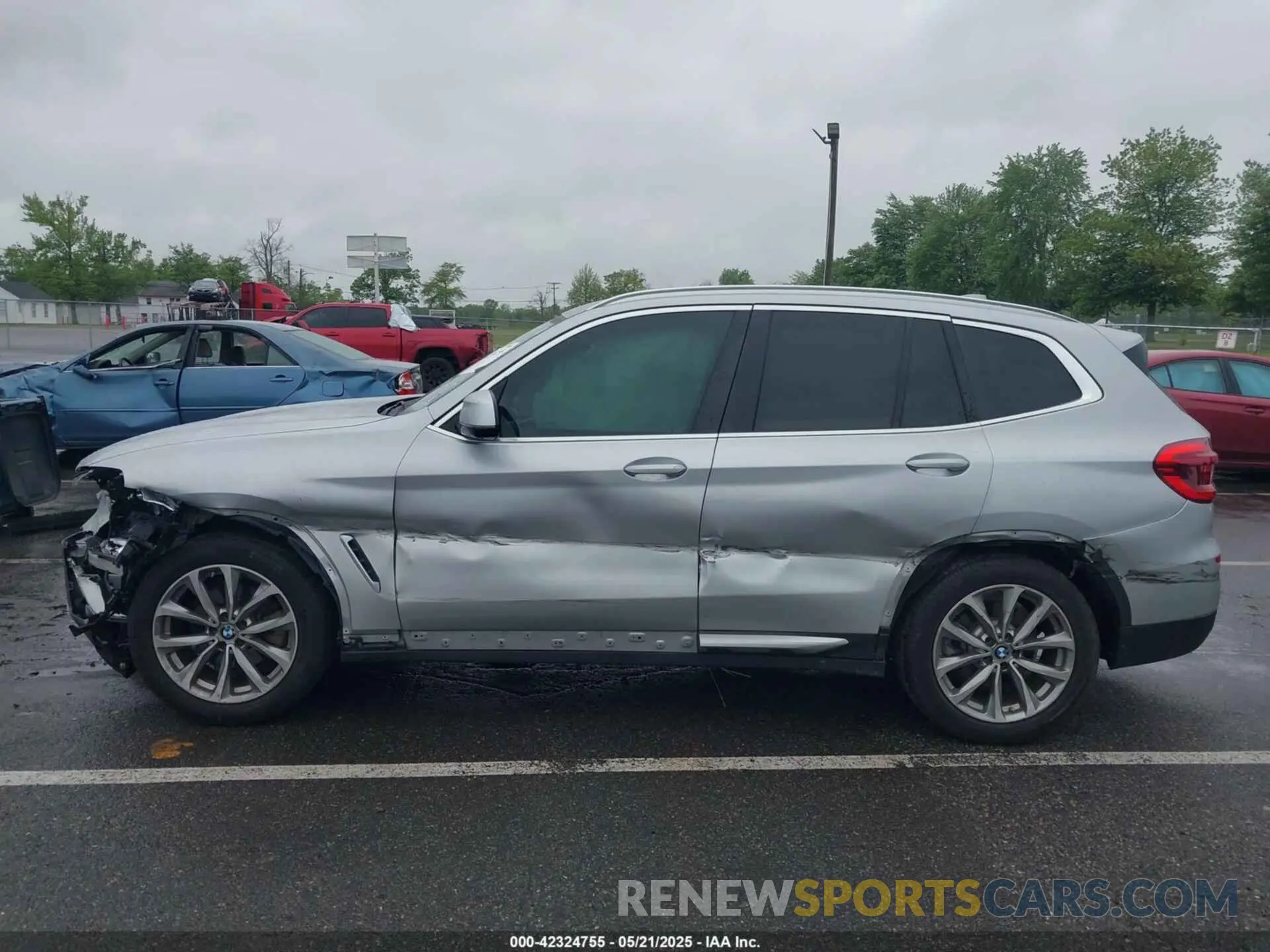 14 Photograph of a damaged car 5UXTR7C50KLF33892 BMW X3 2019