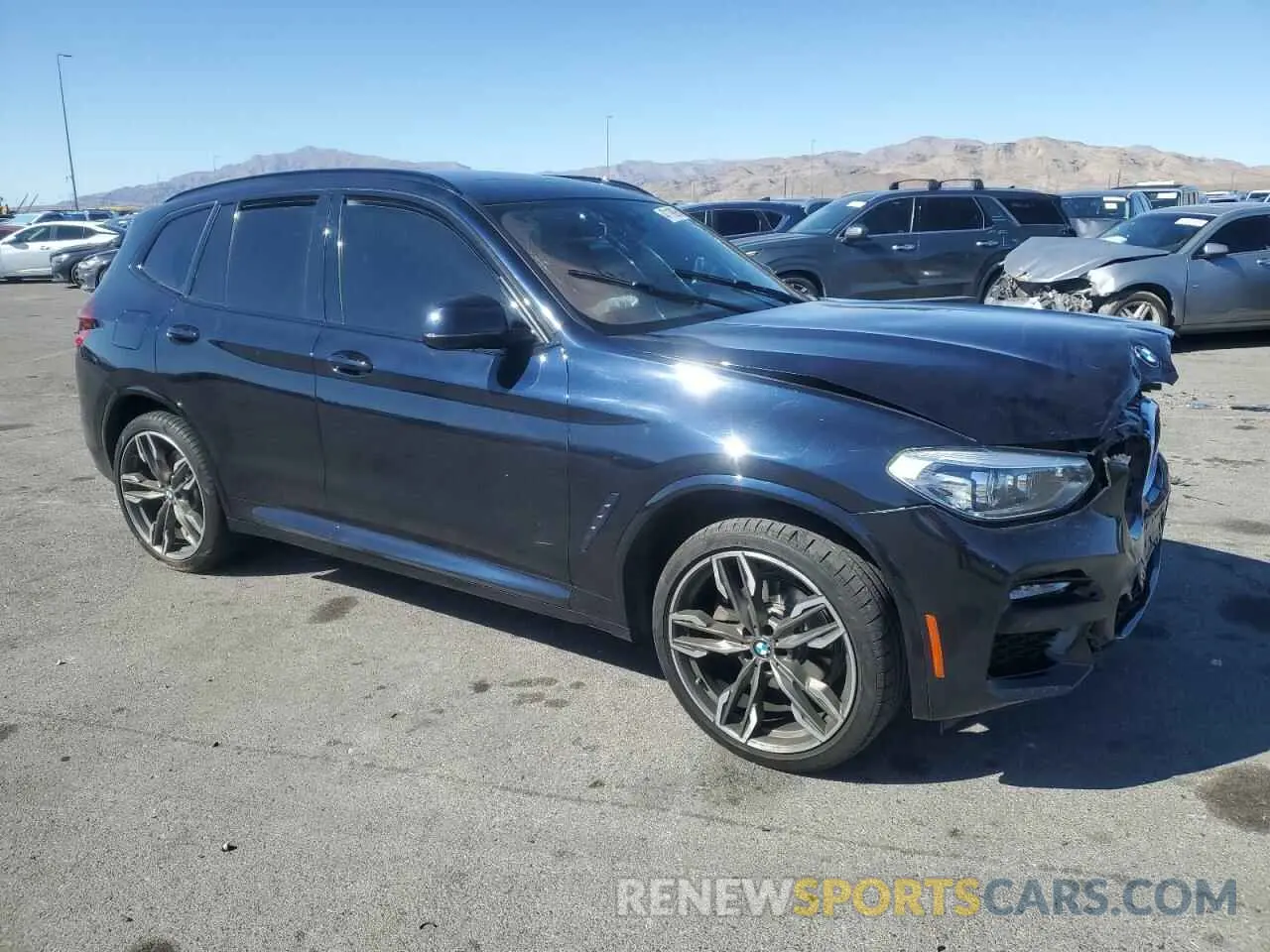 4 Photograph of a damaged car 5UXTR7C5XKLF34323 BMW X3 2019