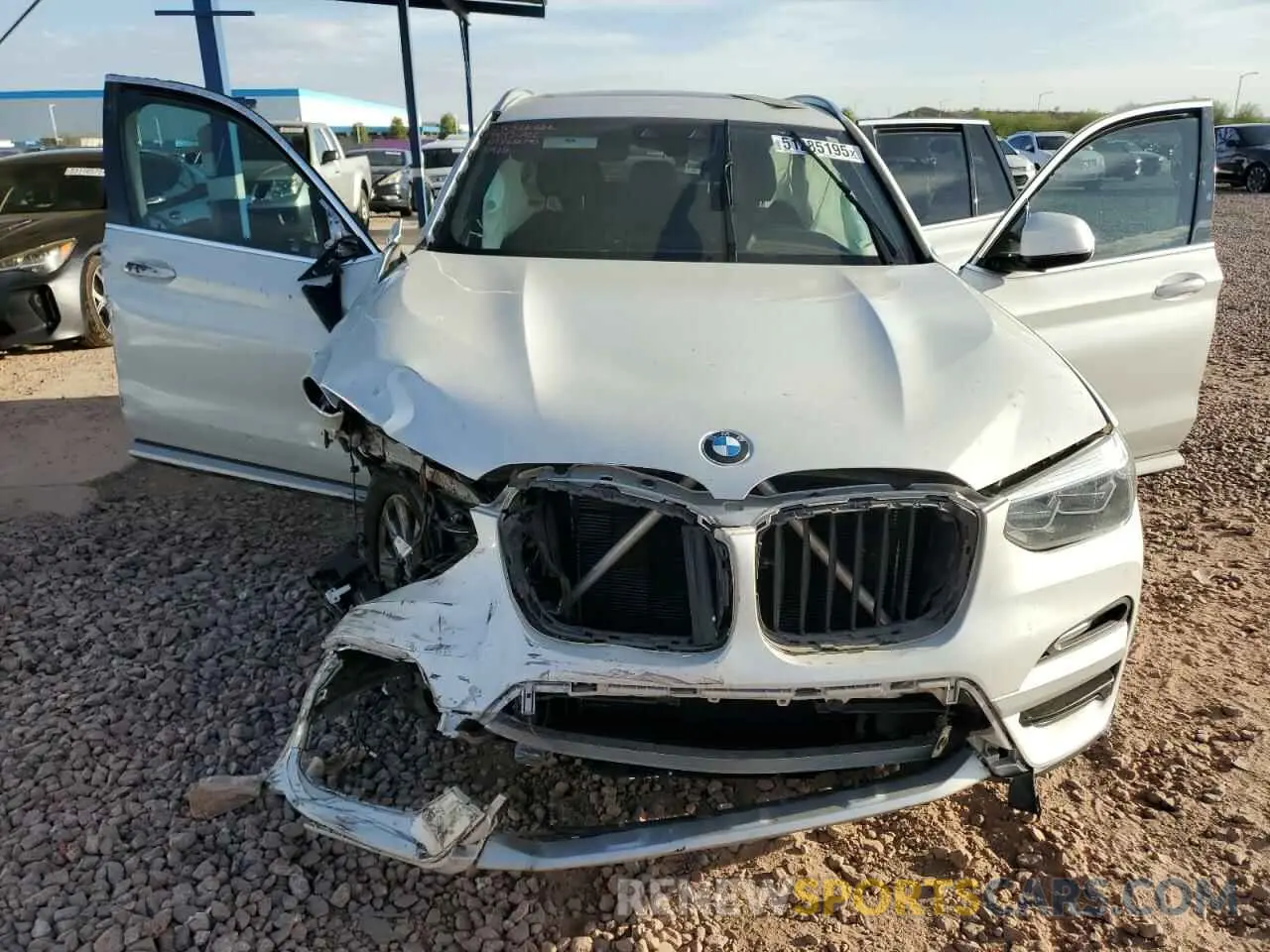 12 Photograph of a damaged car 5UXTR7C5XKLR45928 BMW X3 2019