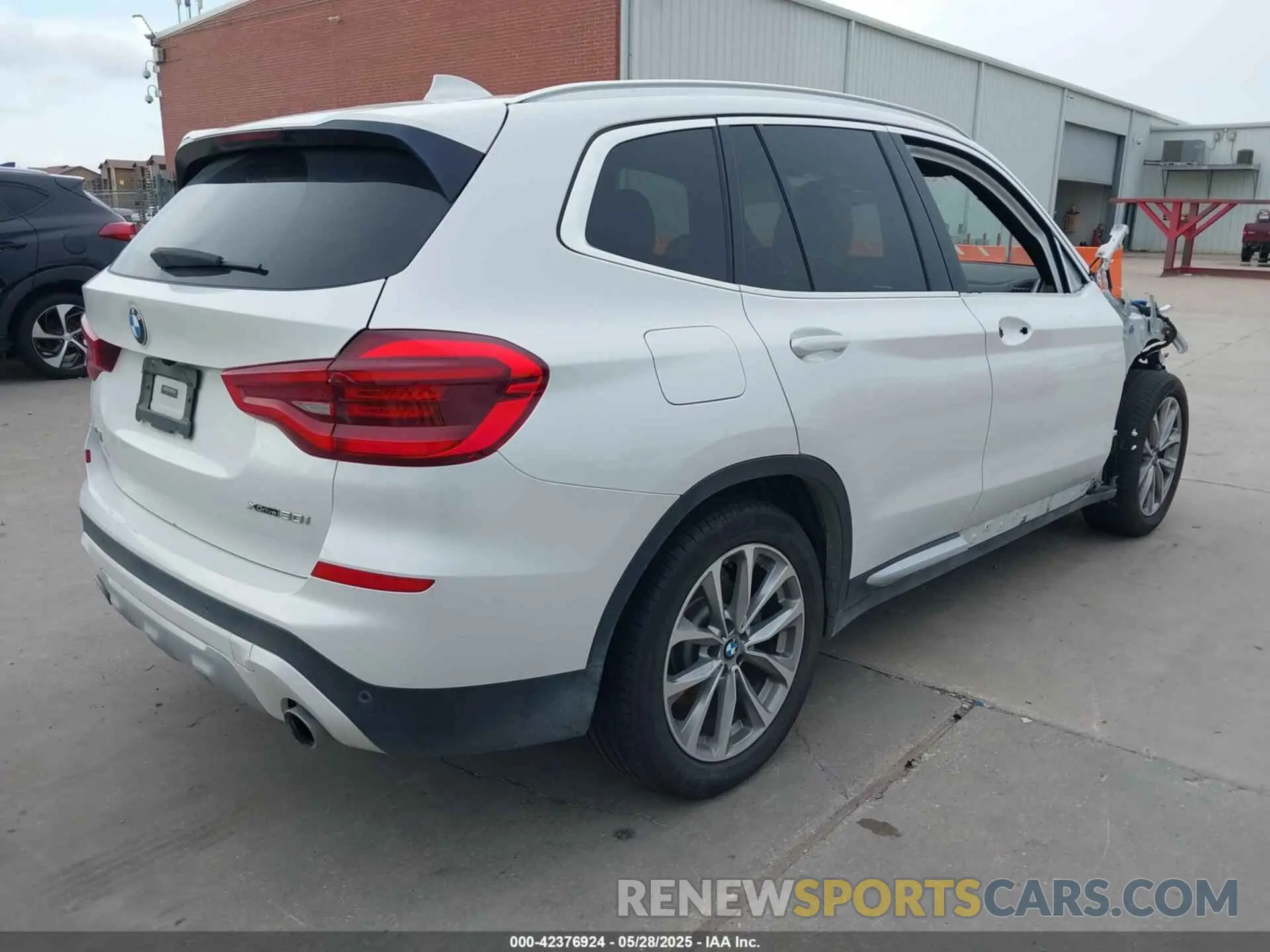 4 Photograph of a damaged car 5UXTR9C56KLP83808 BMW X3 2019