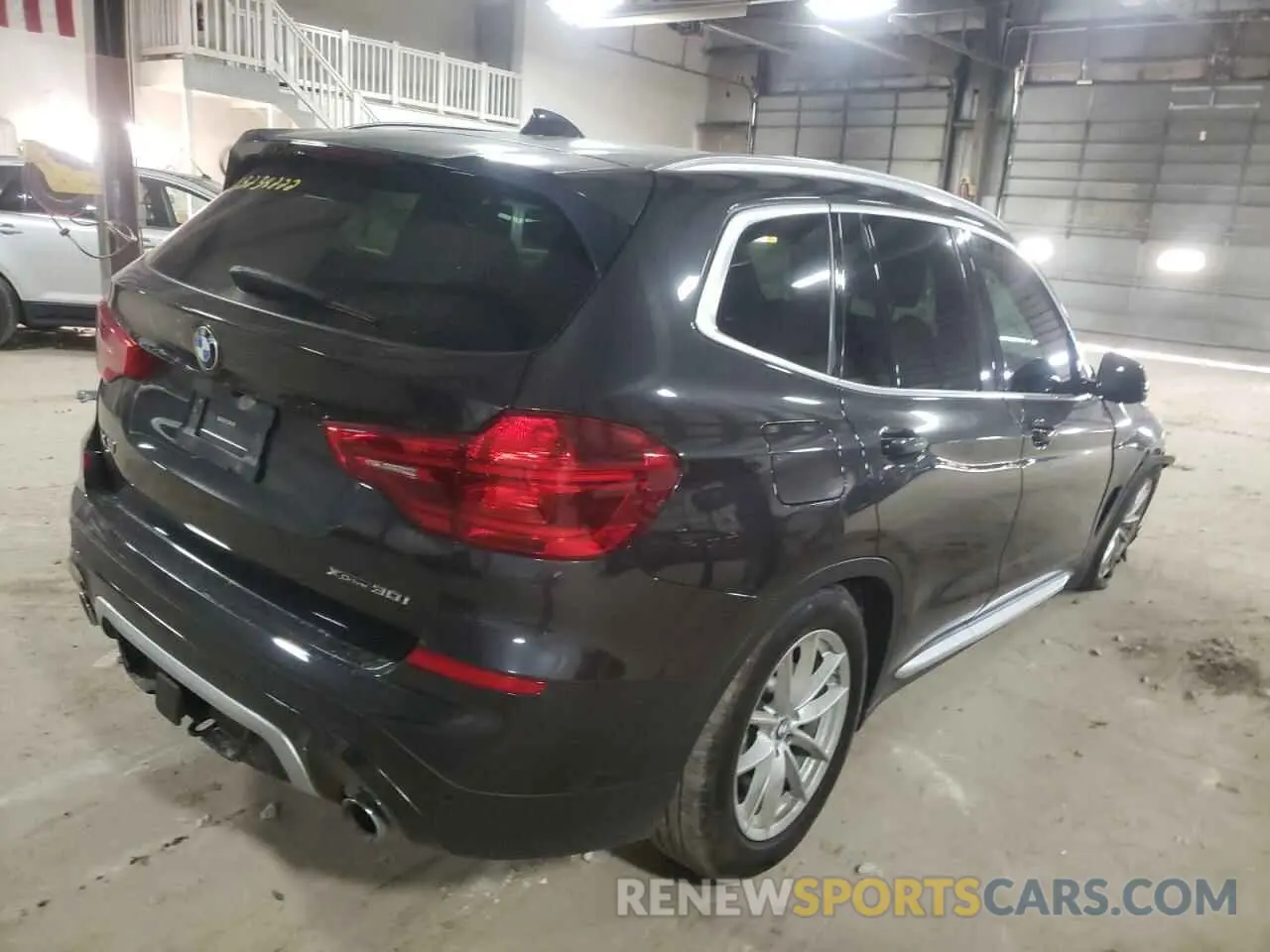 4 Photograph of a damaged car 5UXTR9C57KLD98020 BMW X3 2019