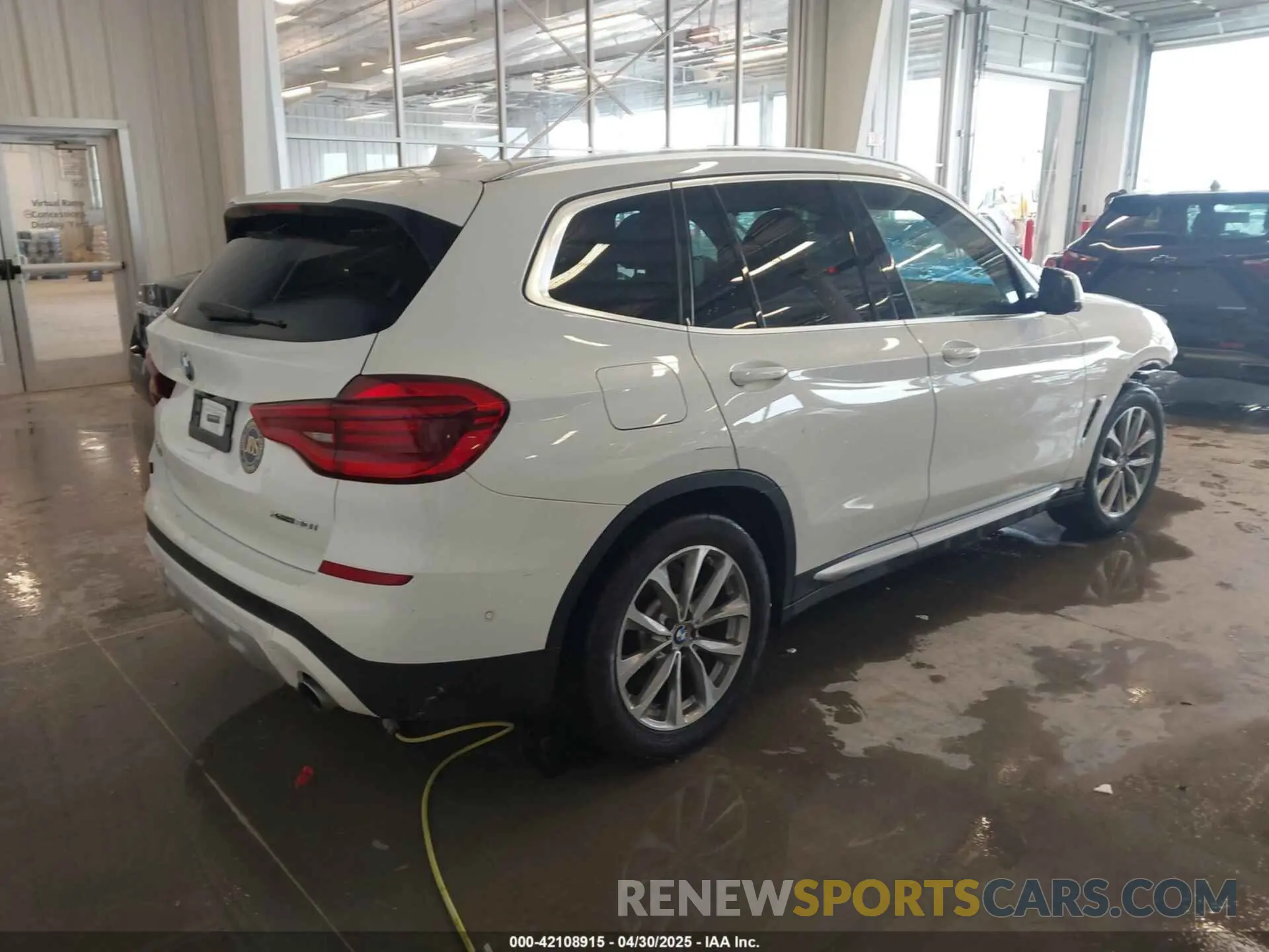 4 Photograph of a damaged car 5UXTR9C57KLP85888 BMW X3 2019