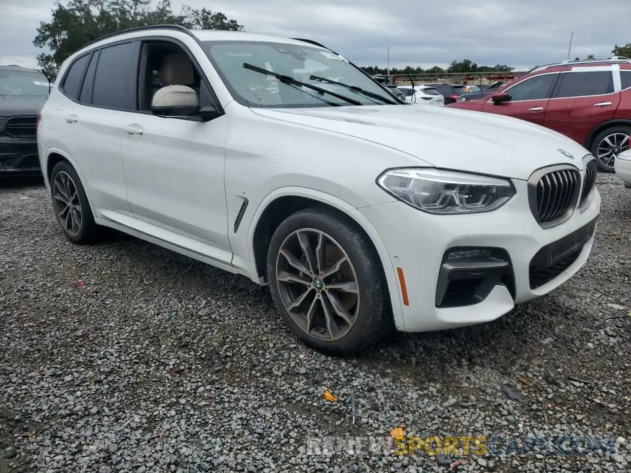 4 Photograph of a damaged car 5UXTY9C04L9D22521 BMW X3 2020