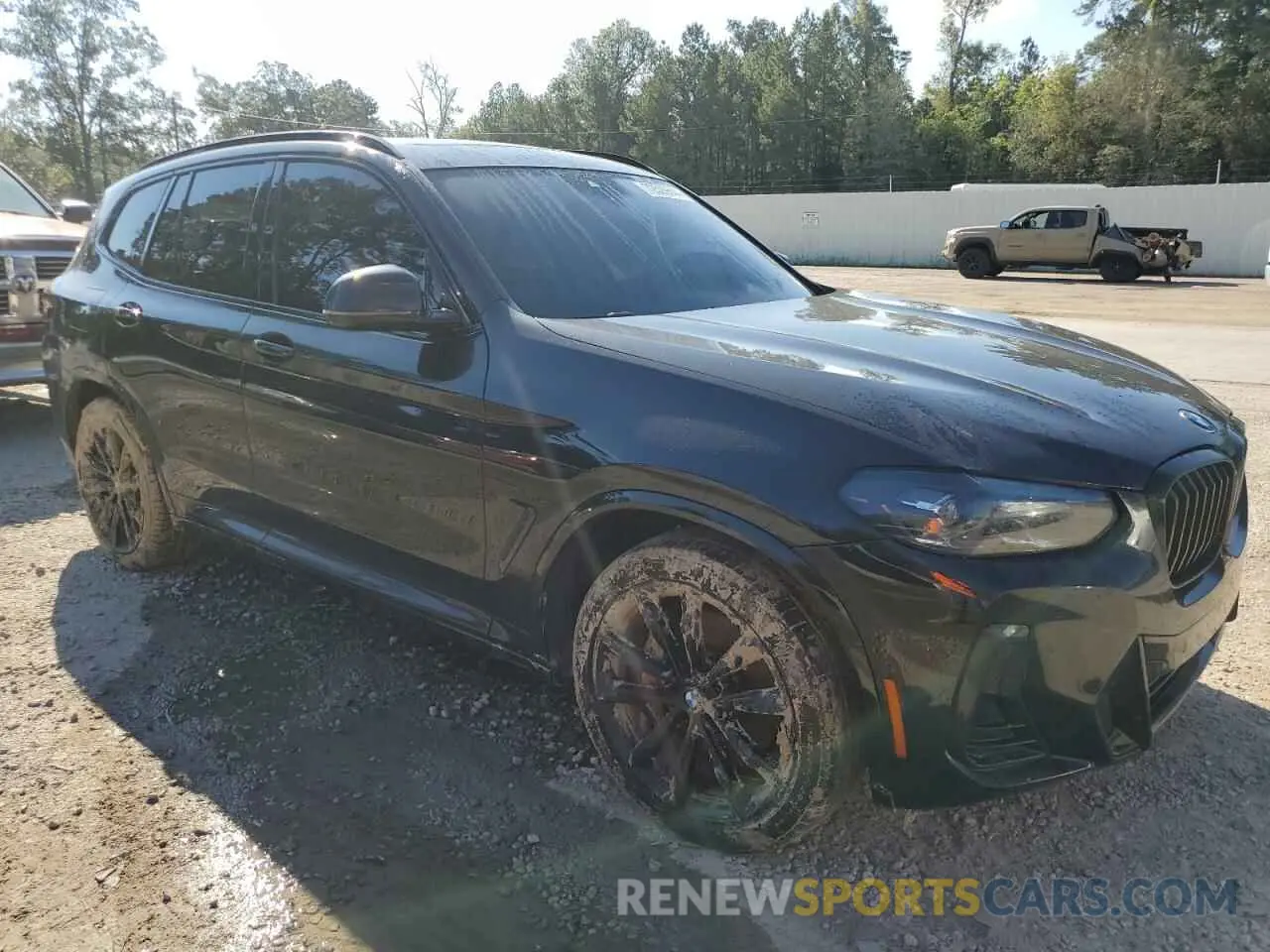 4 Photograph of a damaged car 5UX43DP00N9J03409 BMW X3 2022