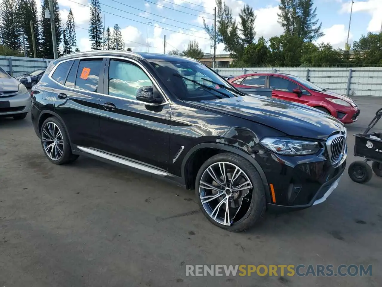 4 Photograph of a damaged car 5UX43DP01N9K99845 BMW X3 2022