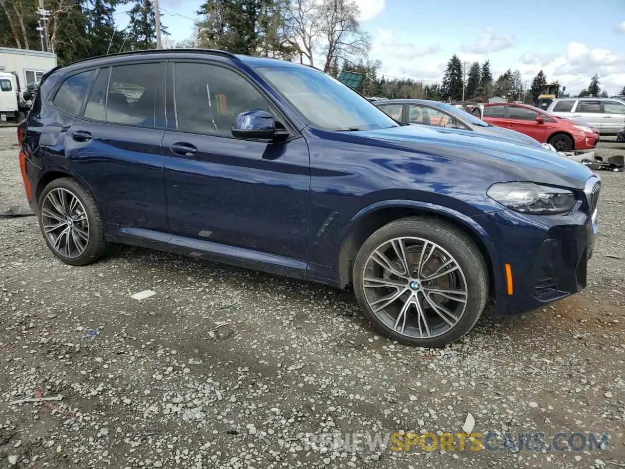 4 Photograph of a damaged car 5UX43DP02N9L66680 BMW X3 2022