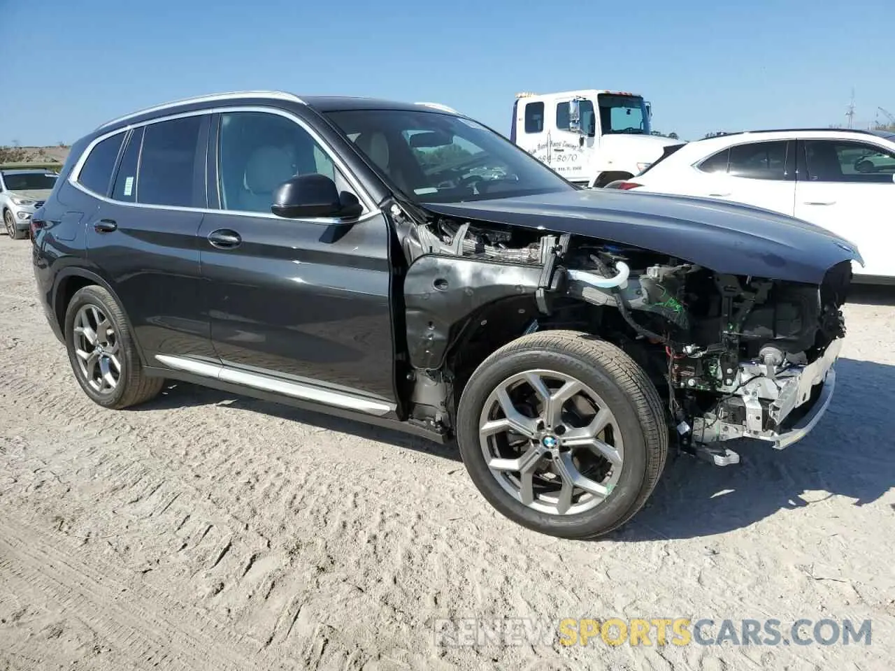 4 Photograph of a damaged car 5UX43DP02N9N07926 BMW X3 2022