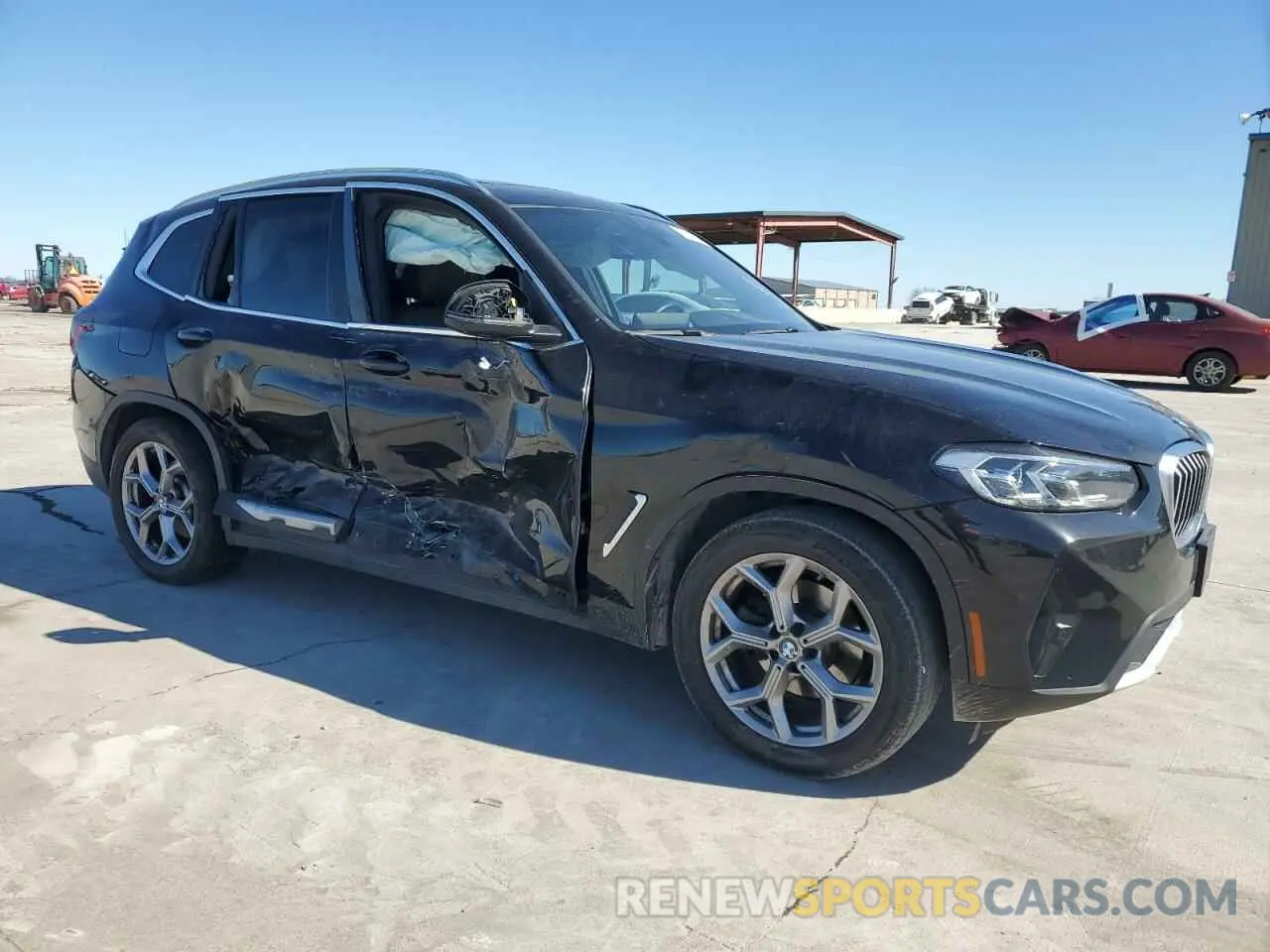 4 Photograph of a damaged car 5UX43DP03N9K85901 BMW X3 2022