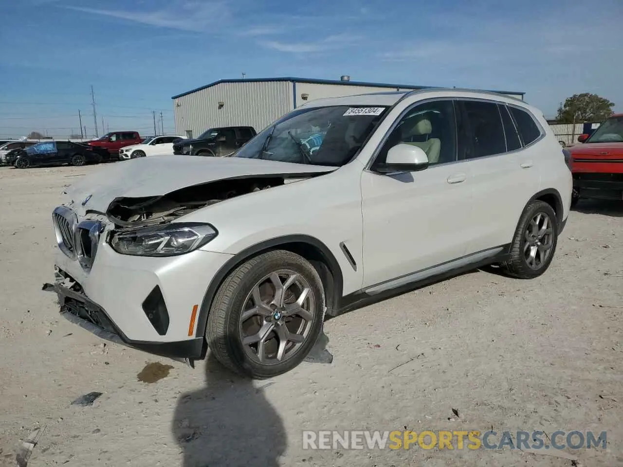 1 Photograph of a damaged car 5UX43DP03N9L84007 BMW X3 2022
