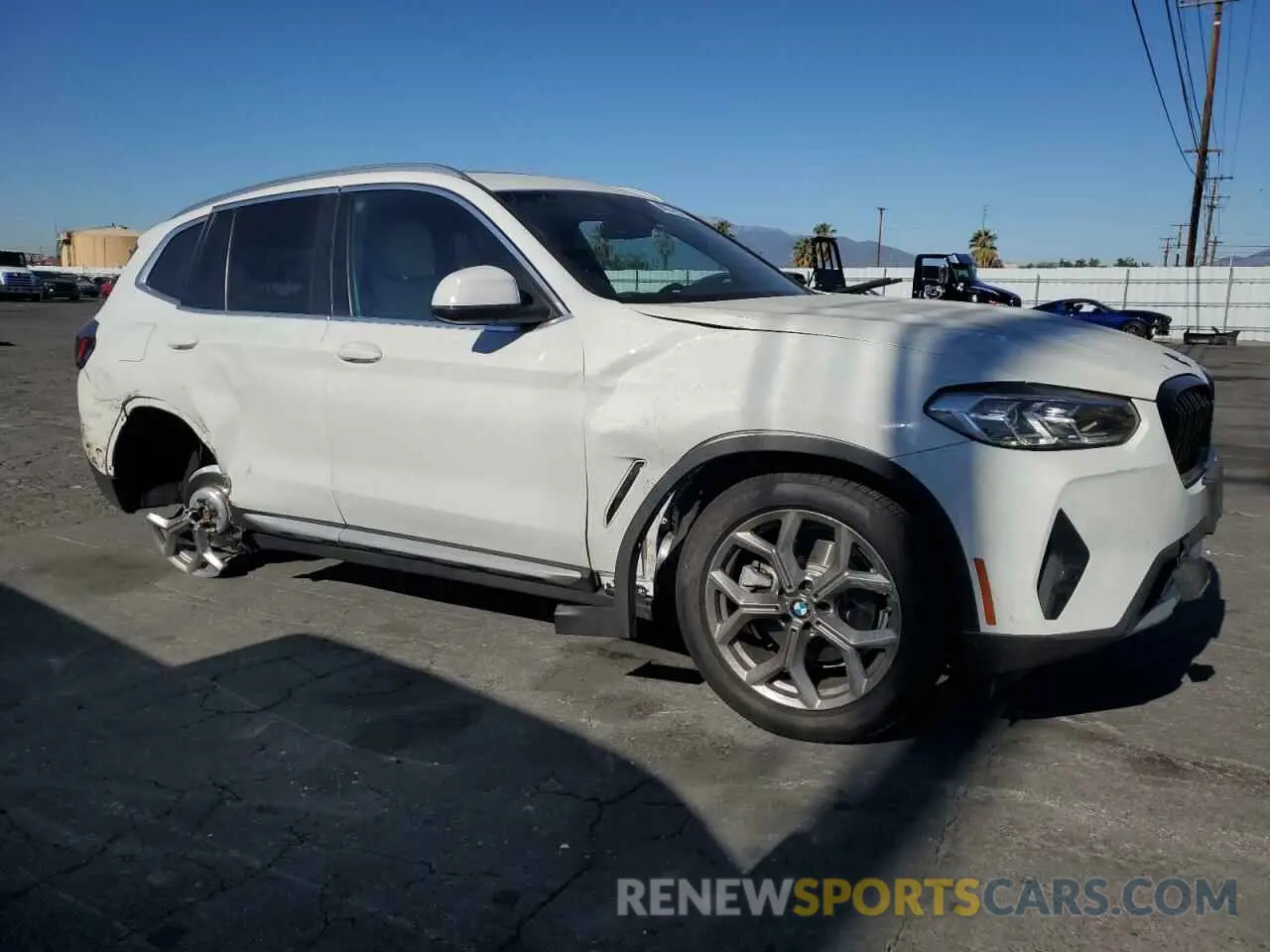 4 Photograph of a damaged car 5UX43DP04N9J44674 BMW X3 2022