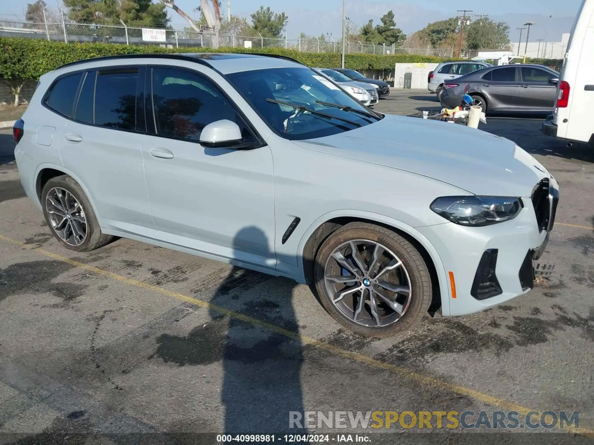 1 Photograph of a damaged car 5UX43DP04N9M75934 BMW X3 2022