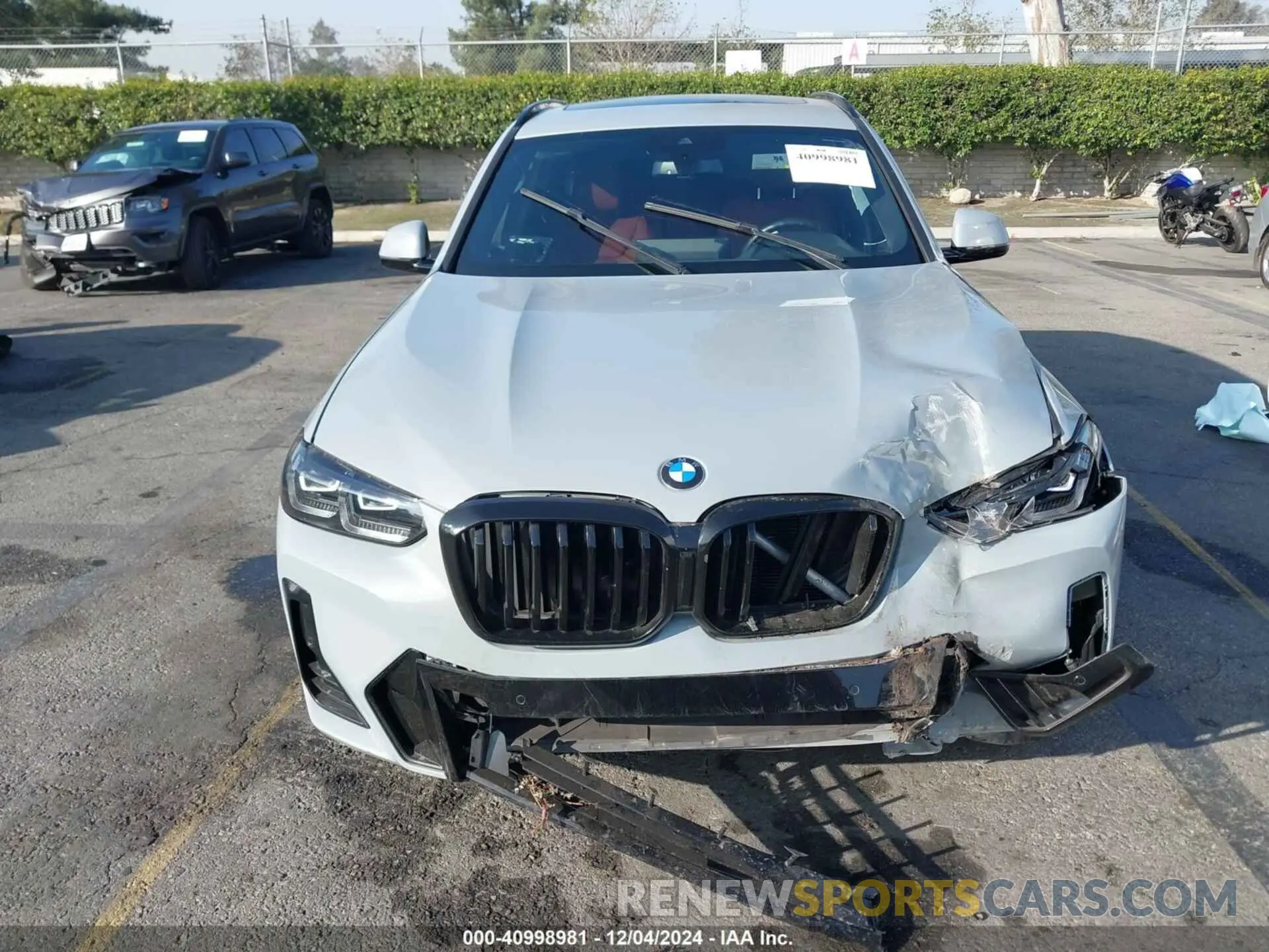 11 Photograph of a damaged car 5UX43DP04N9M75934 BMW X3 2022