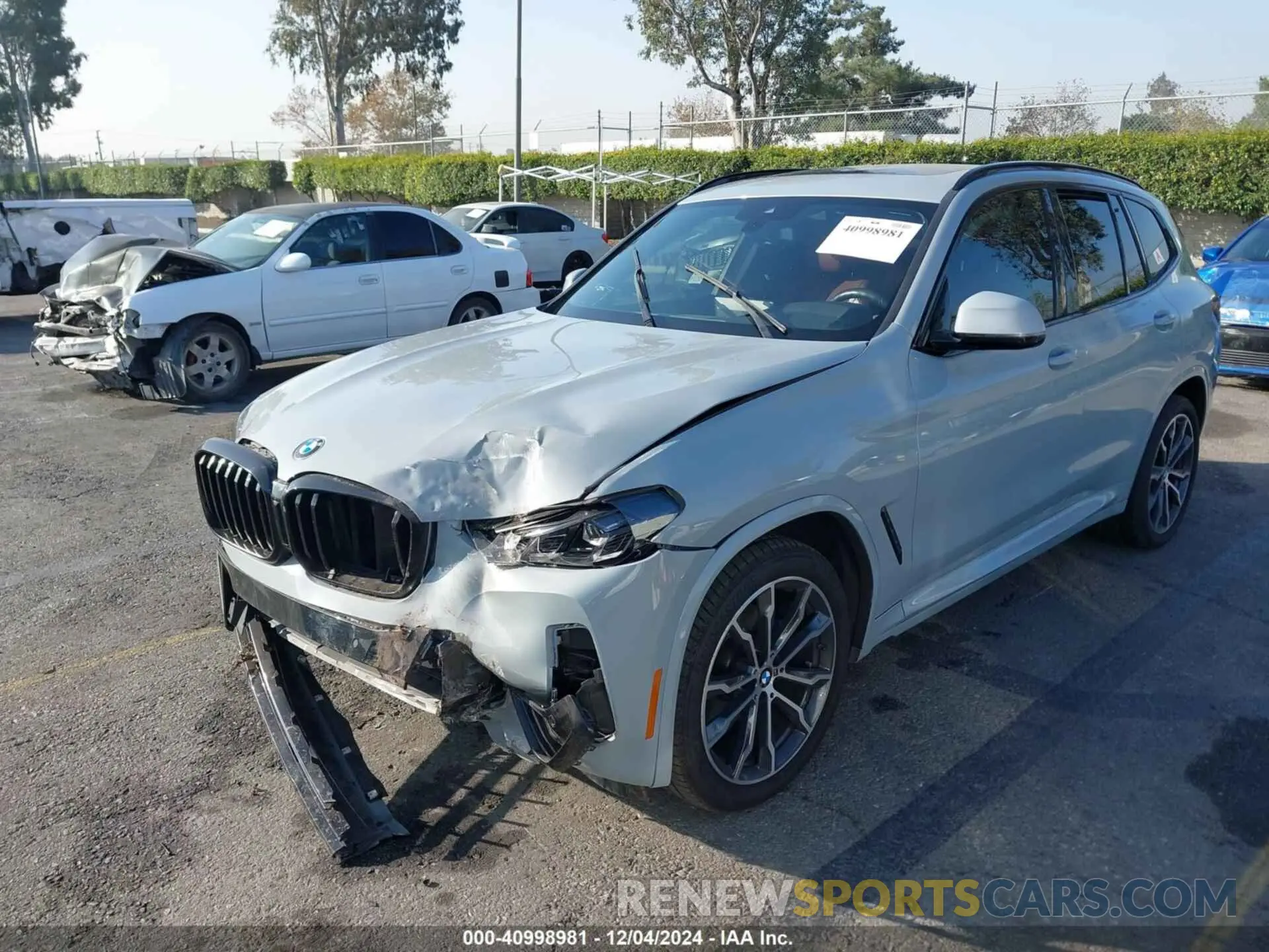 2 Photograph of a damaged car 5UX43DP04N9M75934 BMW X3 2022