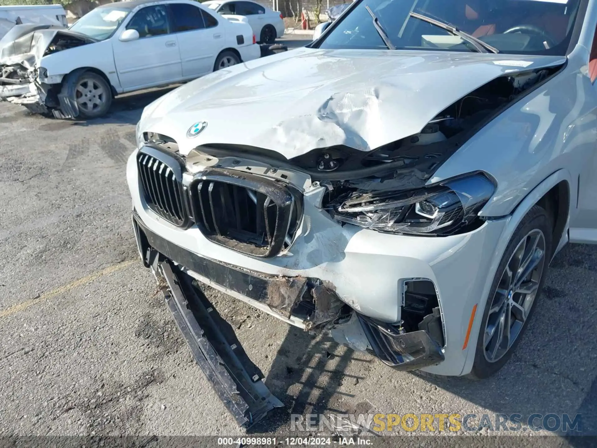 6 Photograph of a damaged car 5UX43DP04N9M75934 BMW X3 2022