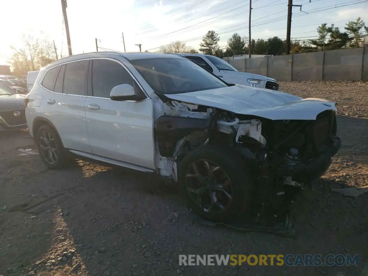 4 Photograph of a damaged car 5UX53DP01N9M29899 BMW X3 2022
