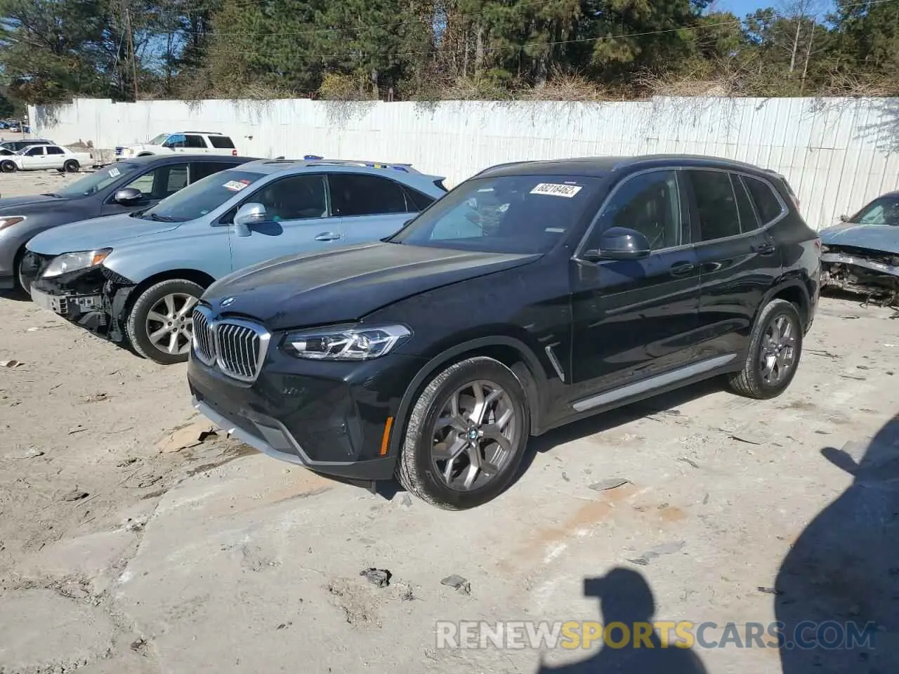 1 Photograph of a damaged car 5UX53DP01N9N23068 BMW X3 2022