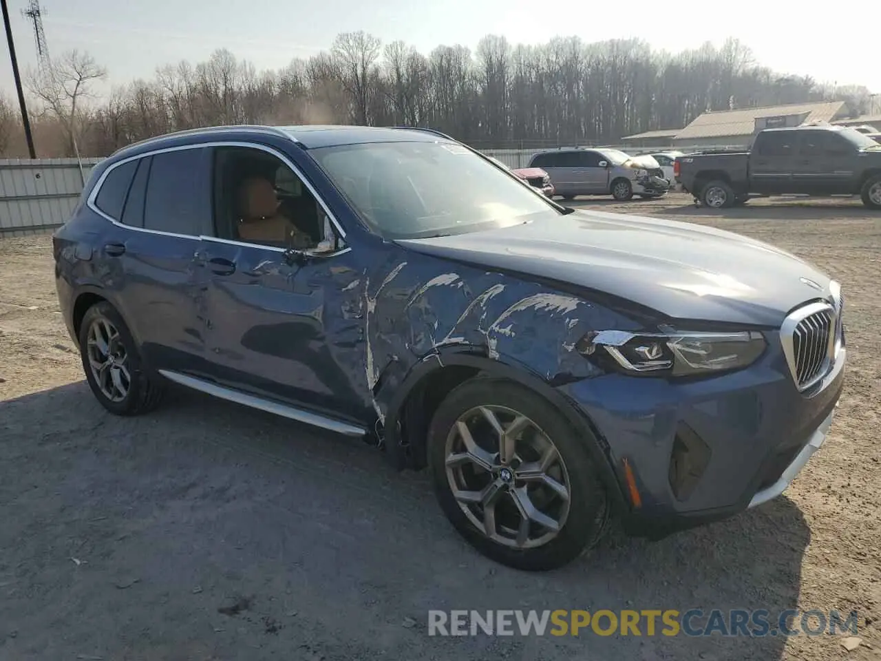 4 Photograph of a damaged car 5UX53DP02N9M16613 BMW X3 2022