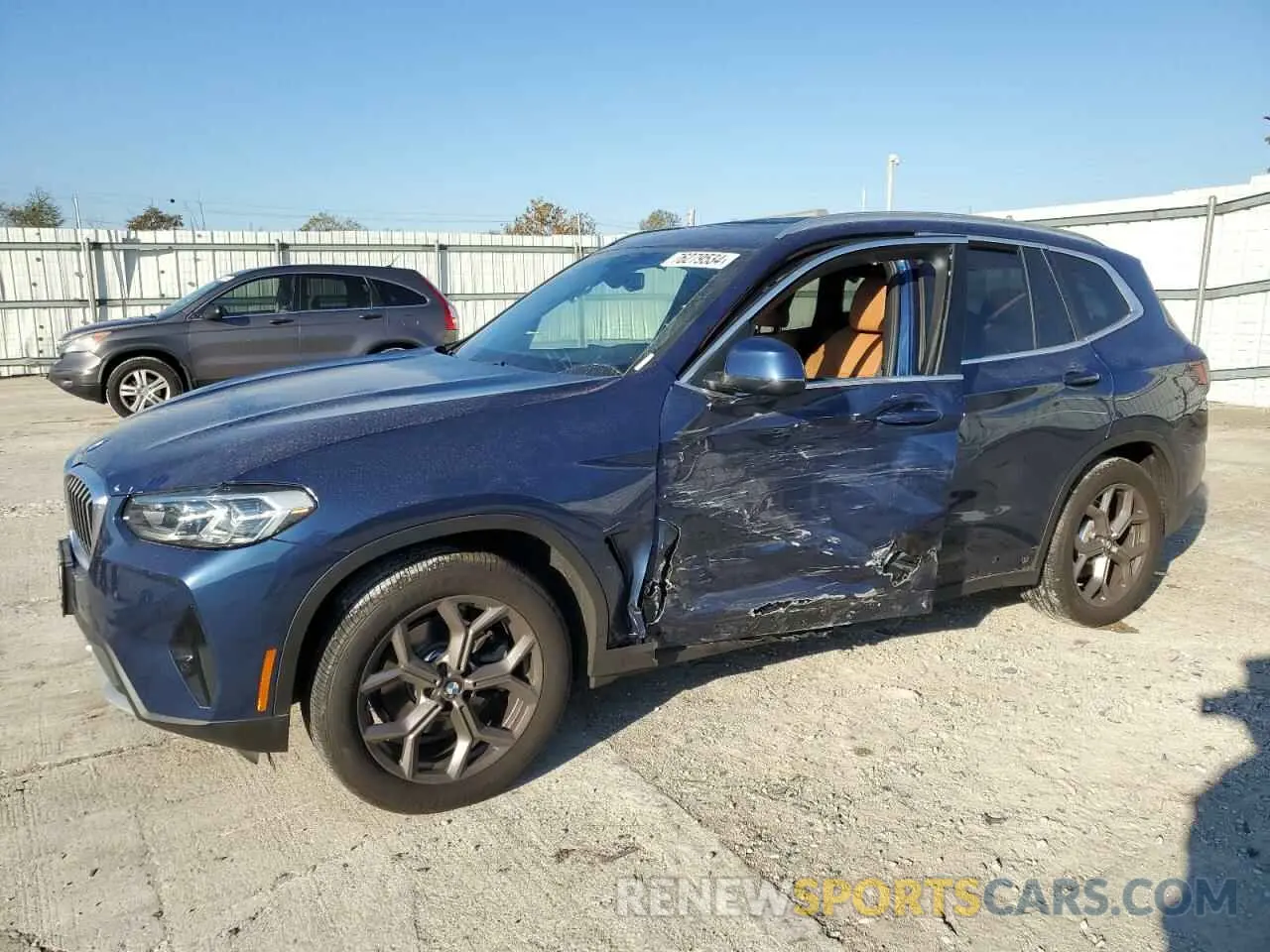 1 Photograph of a damaged car 5UX53DP06N9J02205 BMW X3 2022