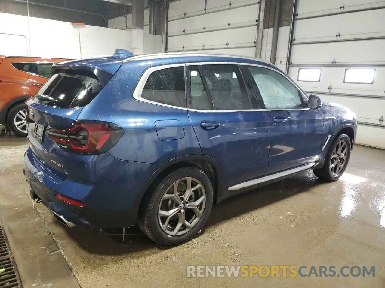 3 Photograph of a damaged car 5UX53DP09N9J89405 BMW X3 2022
